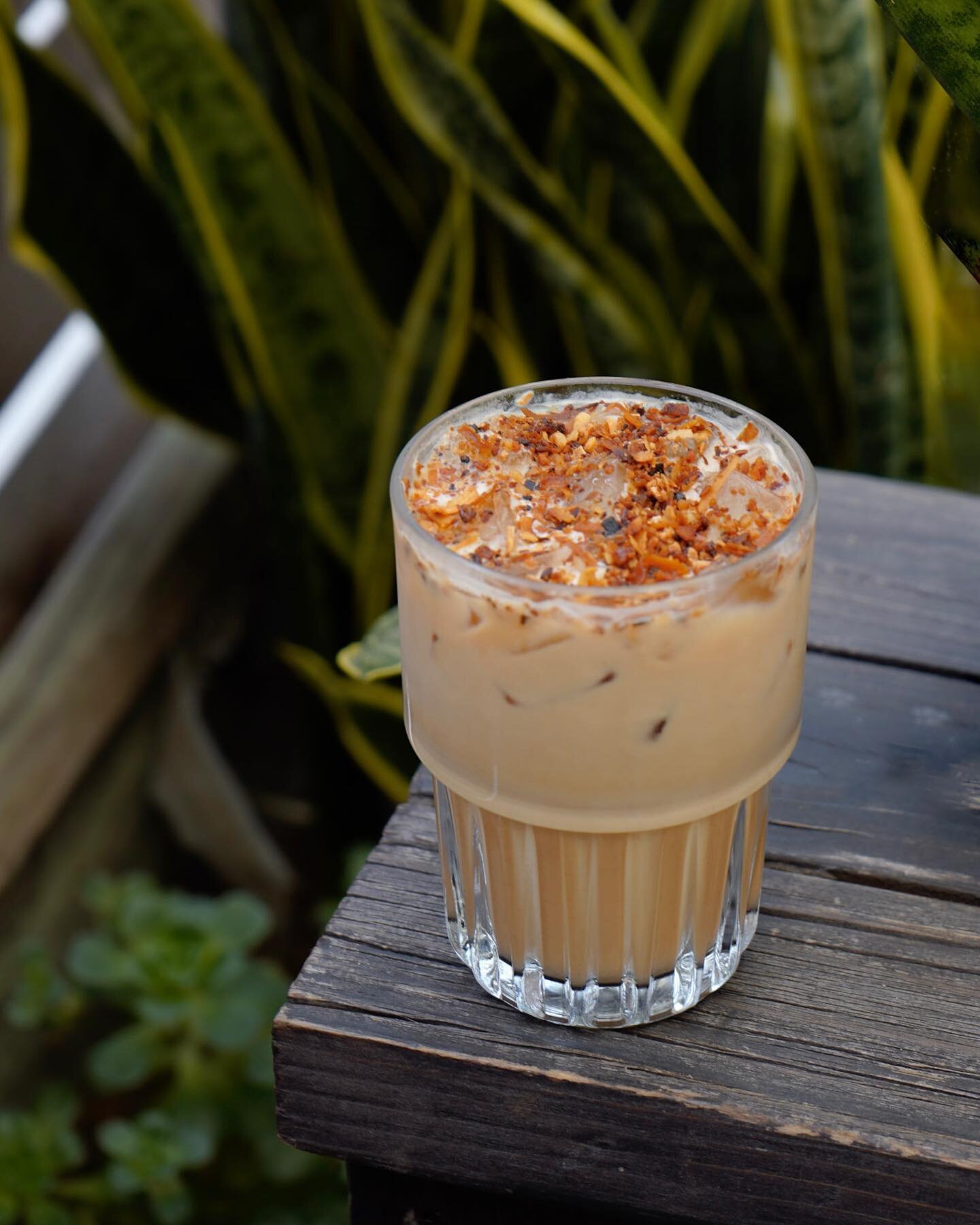 Pretty Nutty Latte: all the tropical vibes combined. Catch this housemade syrup in your lattes all summer long! 🌴

It is best iced and best with oat milk. 

PS. You can ask to hold the toasted coconut-macadamia toppings if that&rsquo;s not your thin