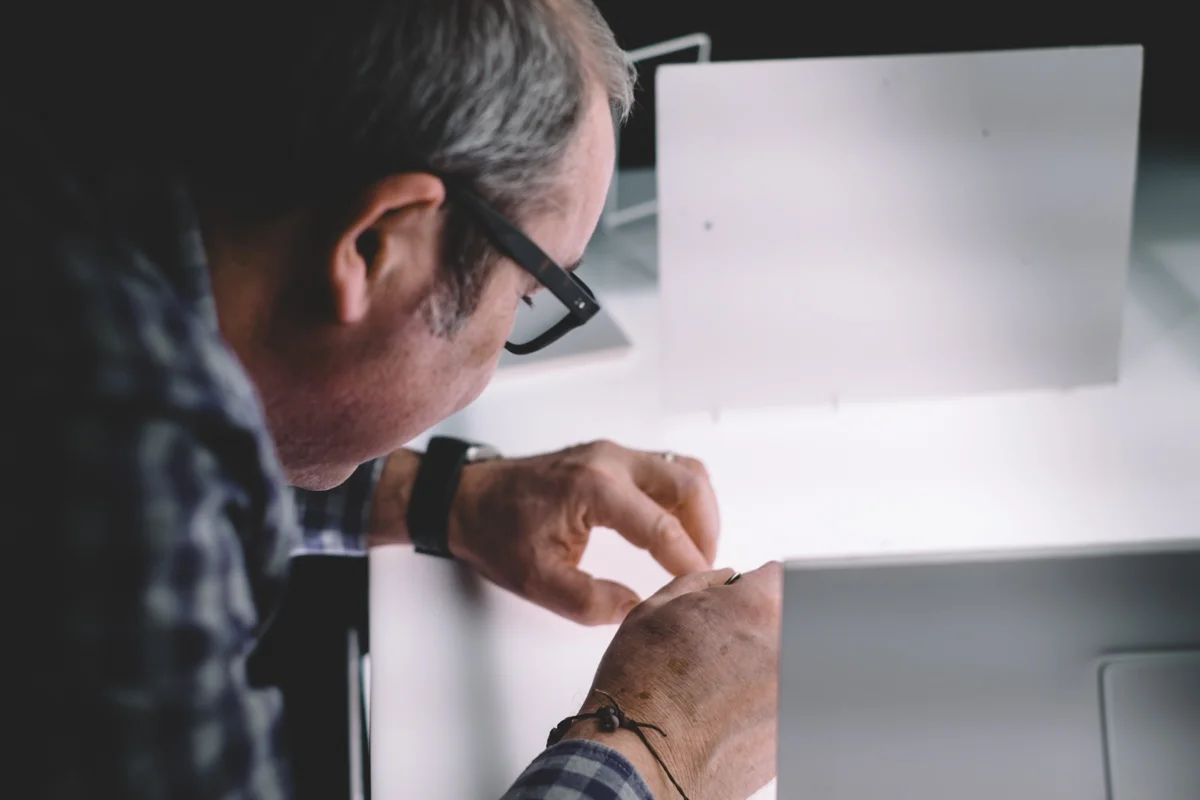 Keith making fine position adjustments to a jewellery shoot