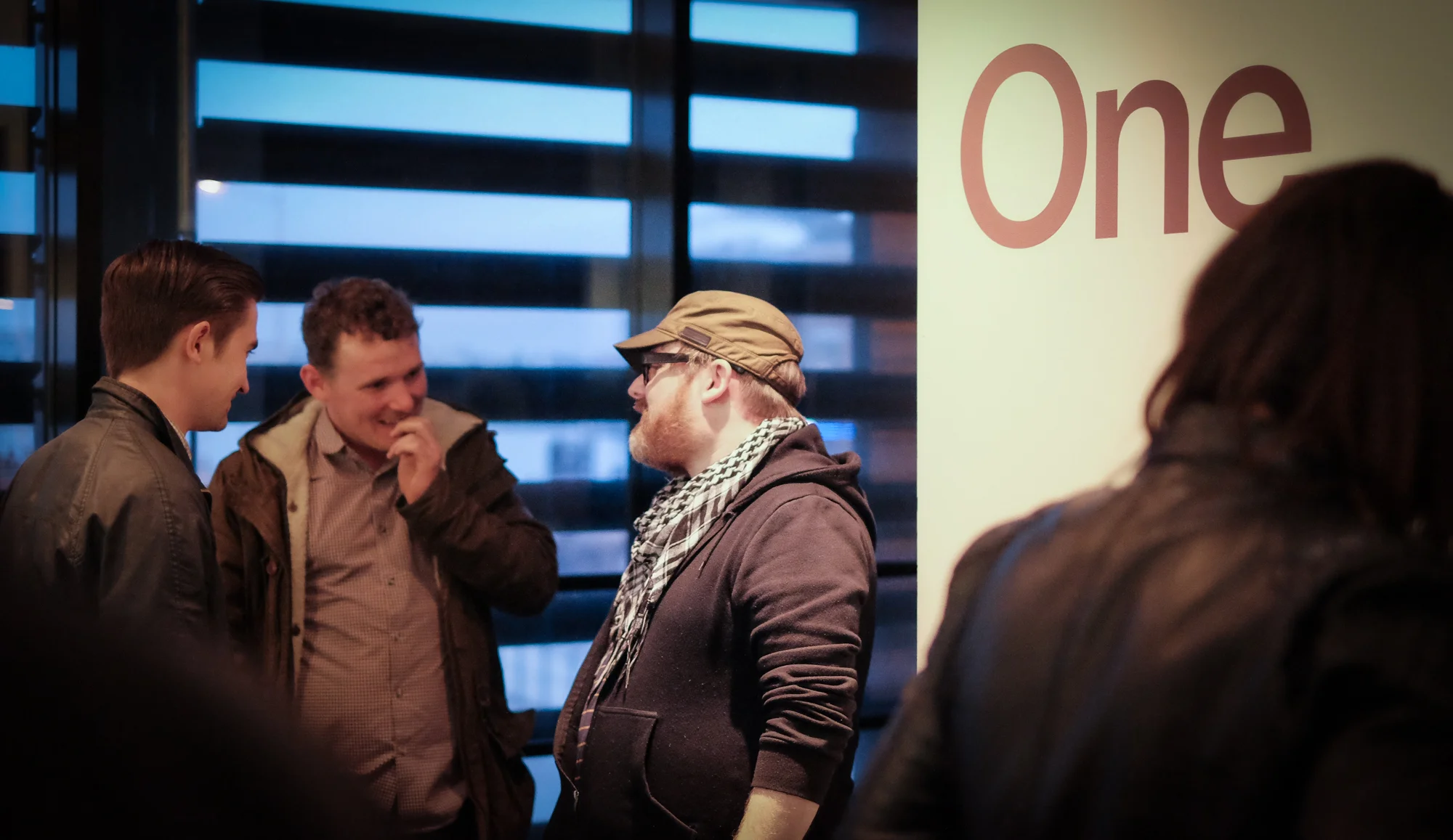 Jon Pountney talking with guests on the show opening night. © Brian Carroll