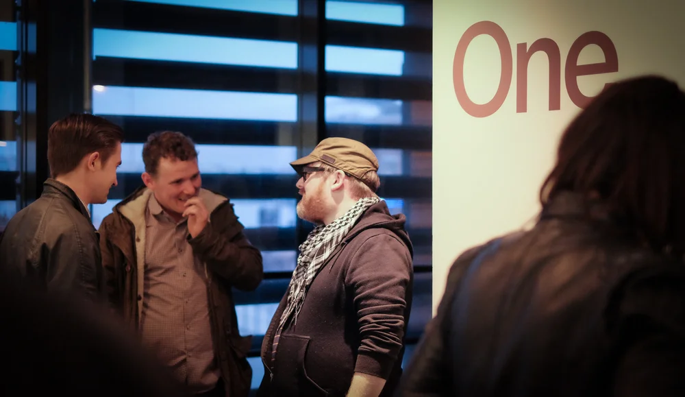 Jon Pountney talking with guests on the show opening night. © Brian Carroll
