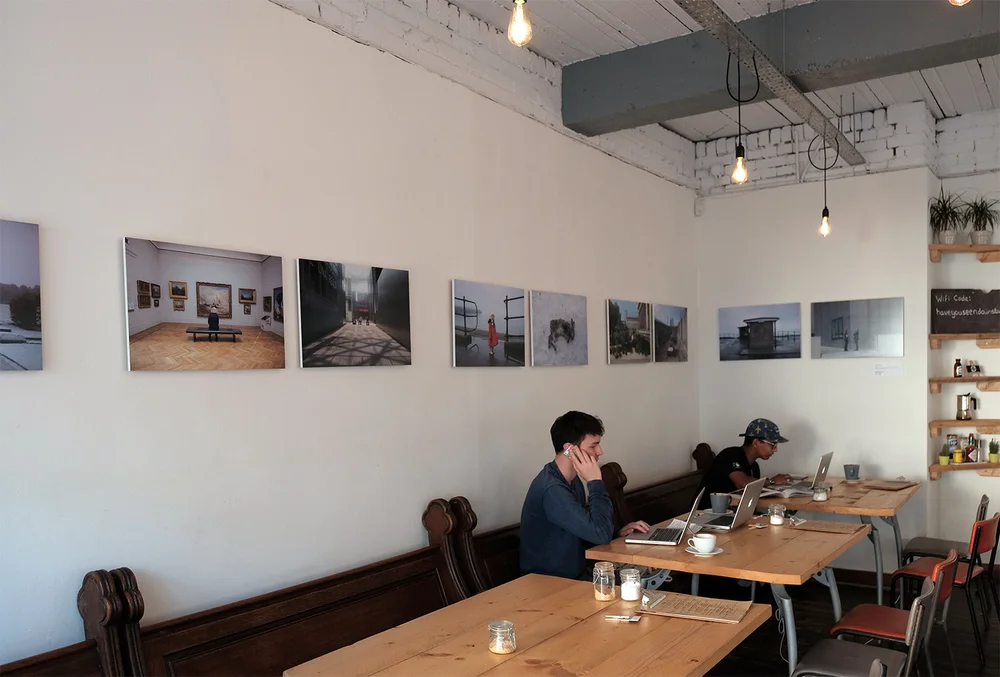 Work by Eleri Griffiths on the walls at Littleman Coffee in Cardiff