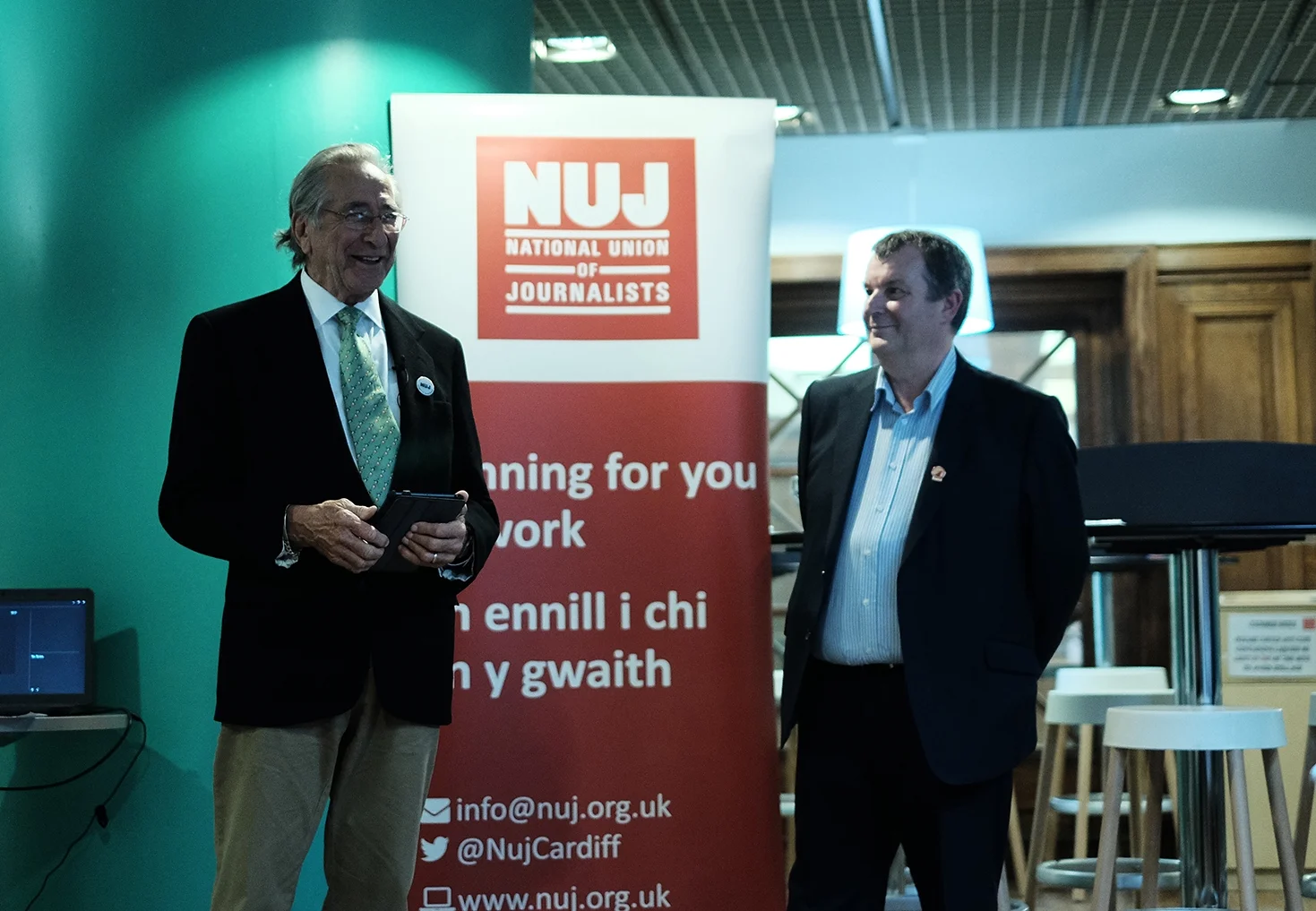 Chuck Rapoport accepting his Award from NUJ South Wales'&nbsp;David Nicholson