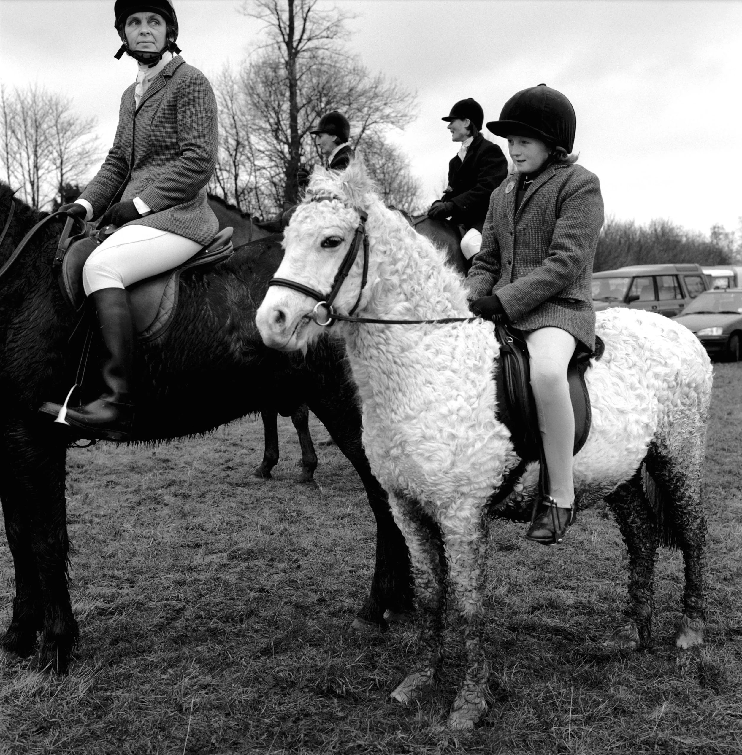 The Duke of Beaufort Hunt. © Homer SykesA young rider on an unusual furry horse. The Boxing Day Meet, Worcester Lodge, near Didmarton, Gloucestershire 2002. Hunting makes a huge contribution to the local rural economy. It is estimated that around 80…