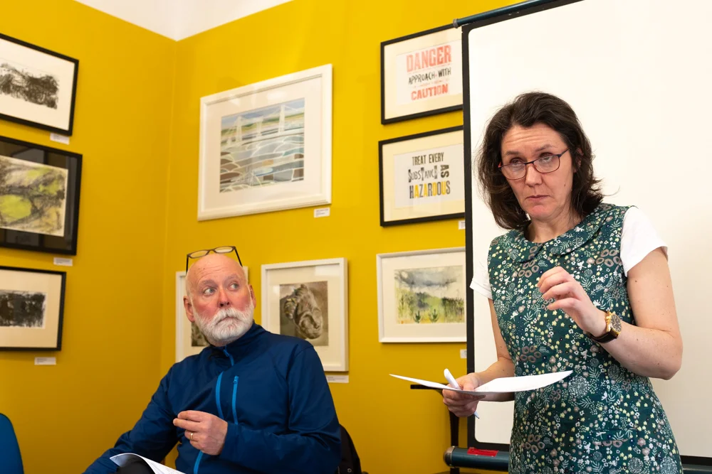 Gayle Rogers from The Workers Gallery tells the audience of the work and facilities offered by the Gallery to the local community before introducing Paul.