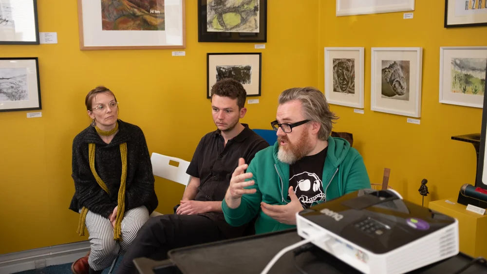 Jon Pountney (right) introduces the South Wales Project and fellow members Anna Jones and Siôn Marshall-Waters.