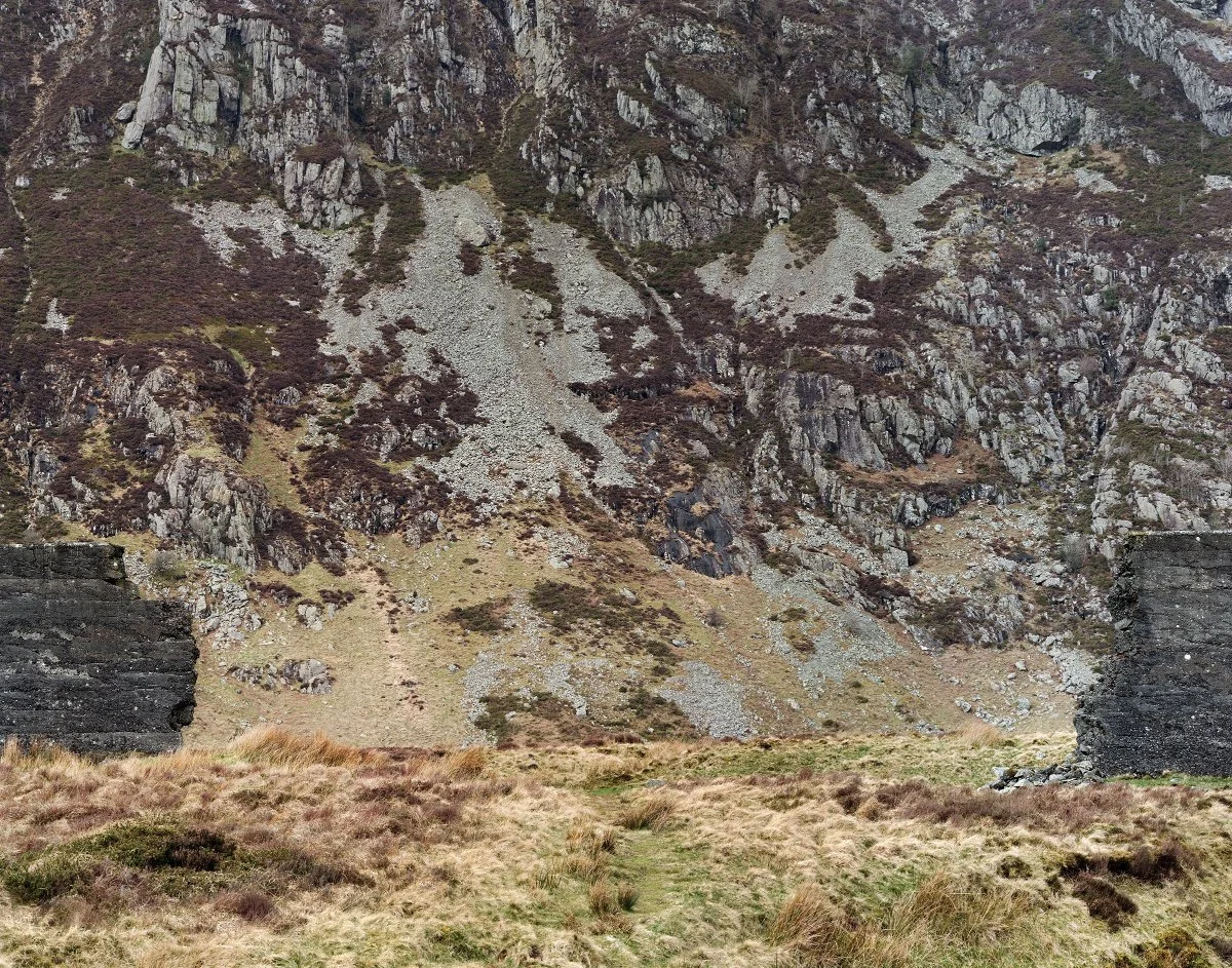 'Cwm Eigiau' - photograph of the large breach in the dam wall. Image copyright by Aled Rhys Hughes