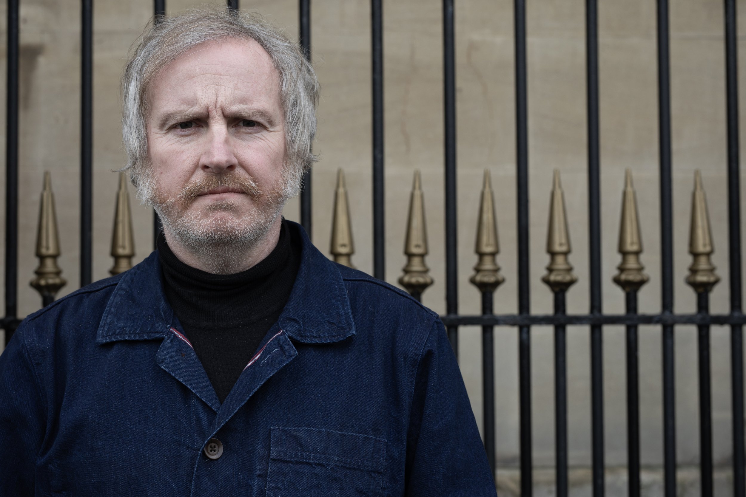 Portrait photograph of Karl Morgan. Exhibitions Officer, Swansea Museum. Portrait copyright © Emyr Young