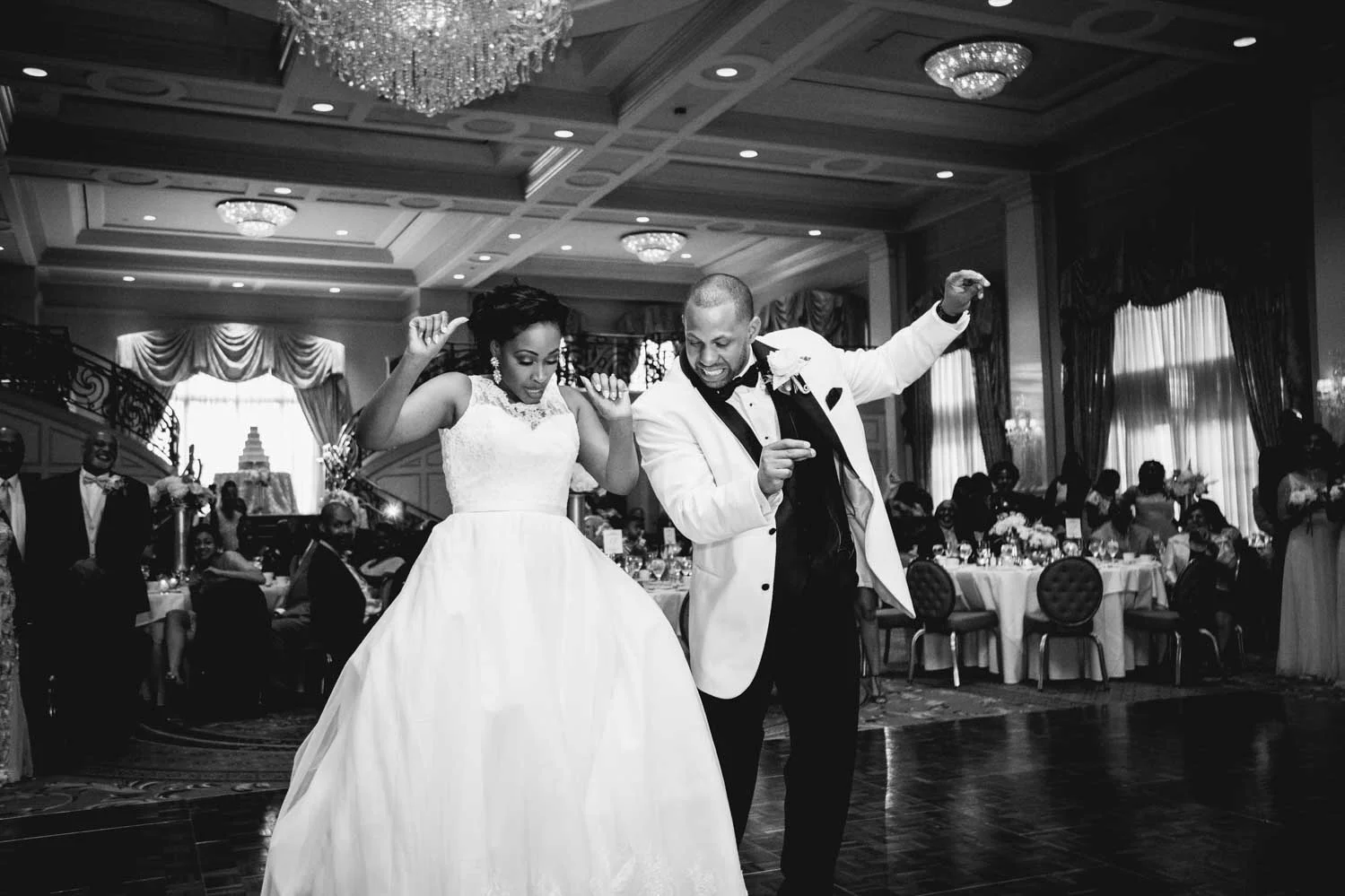 Bride and groom bust out some incredible dance moves during their wedding at the Prestonwood Country Club Ballroom in Cary, NC.