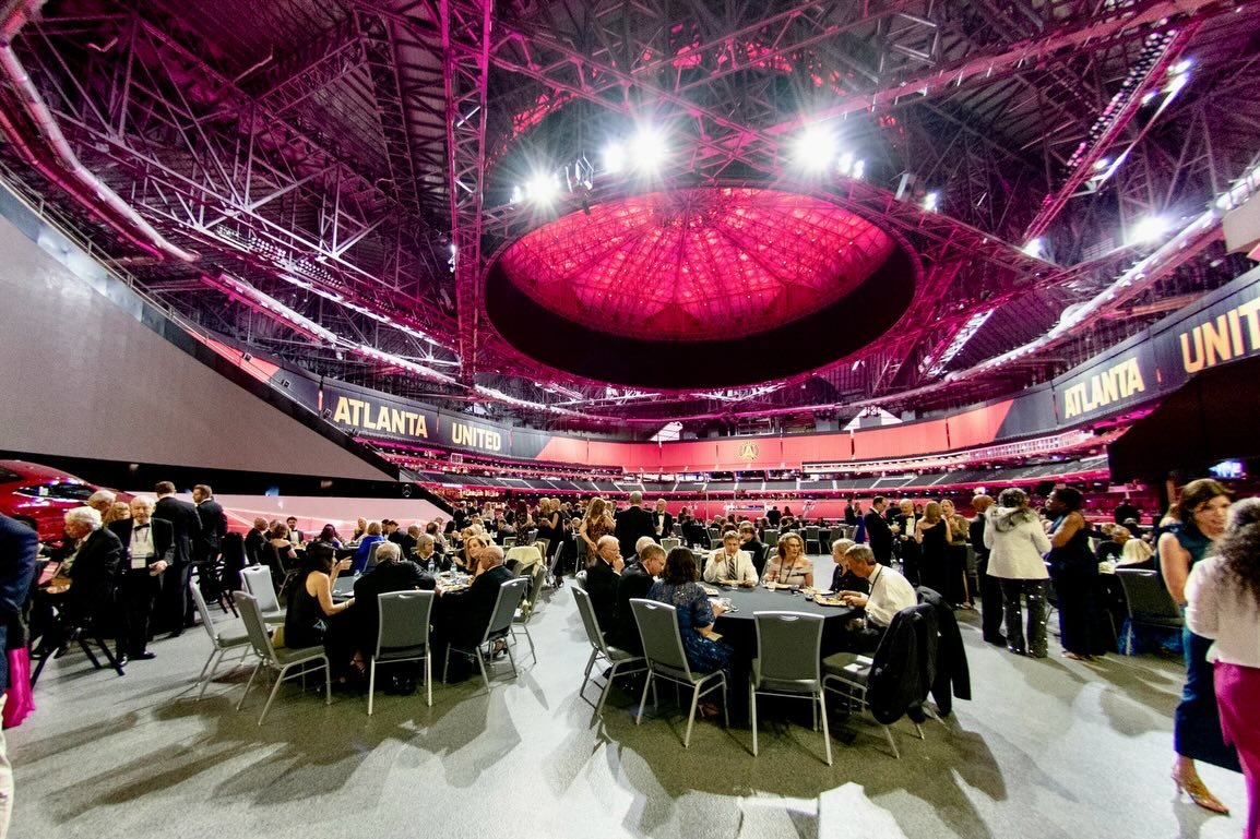 Not your typical conference night: 
Drum corps. Stadium lights. Freddie the Falcon. An epic evening with Hinman Dental Meeting at Mercedes-Benz Stadium!