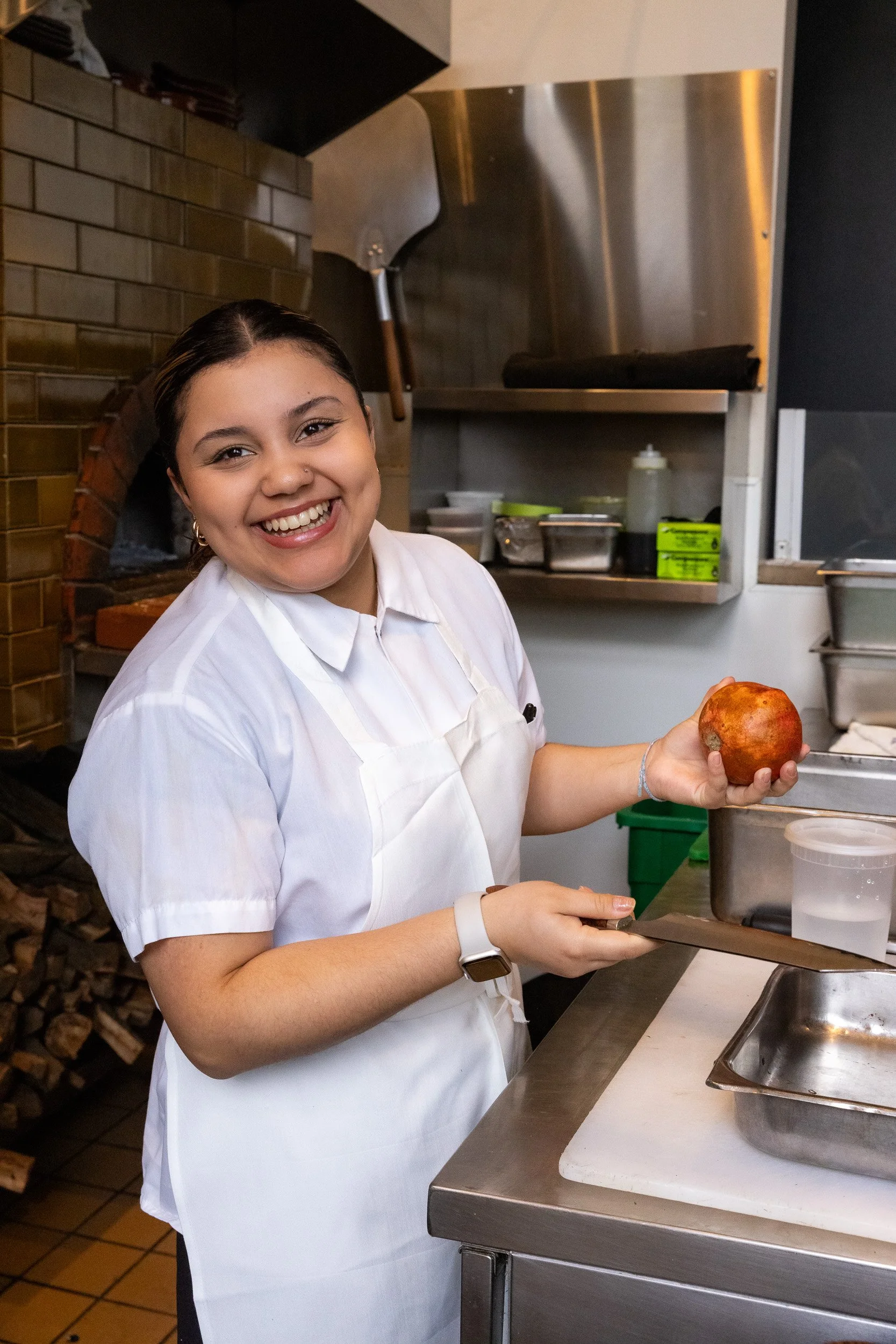 Student cooking in Sprouts Chef Training