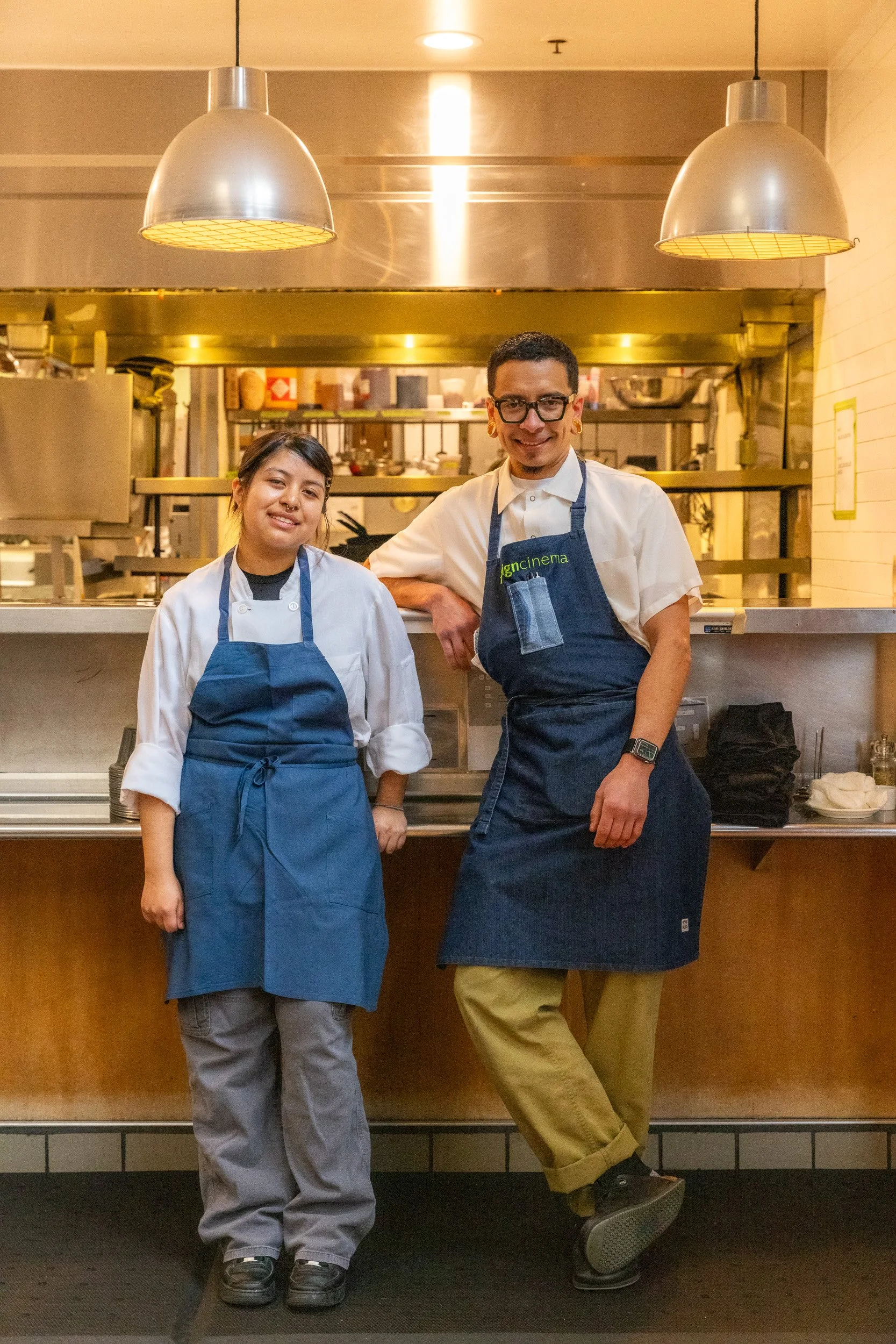 Two standing for Sprouts Chef Training
