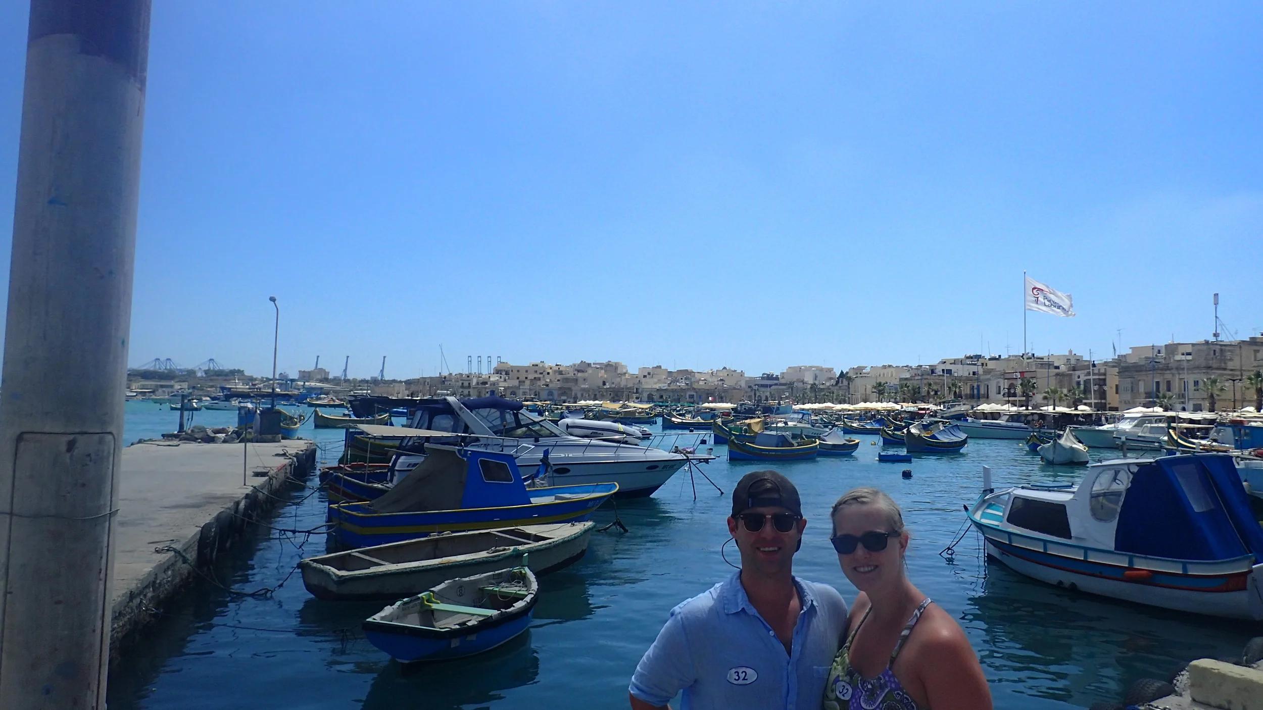 We went to a Maltese fishing village with colorful boats.