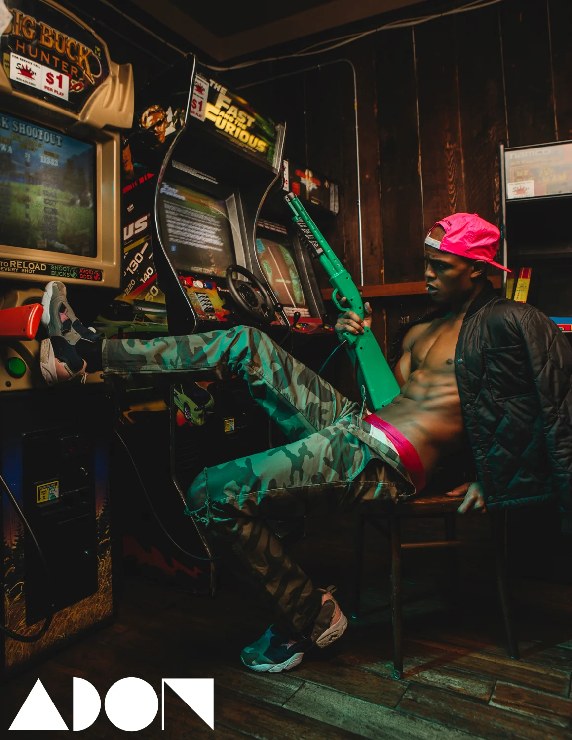 Pink capby Marc by Marc.  Jacket by Ralph Lauren.  Pink speedo by Marc byMarc. Pants by Ralph Lauren shoes by reebok