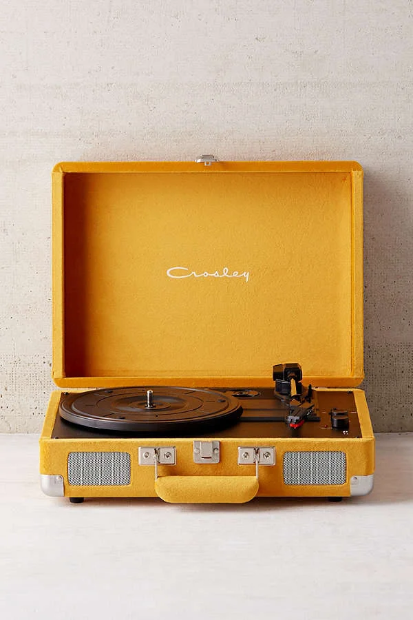 Portable vintage-inspired turntable, totally exclusive to UO in Limited Edition velvet, from the experts at Crosley. This record player is perfect for playing your favorite vinyl LPs, and comes complete with everything you need for the ultimate vinyl experience. To play outside of the US, please pair with a power converter. UO Exclusive.