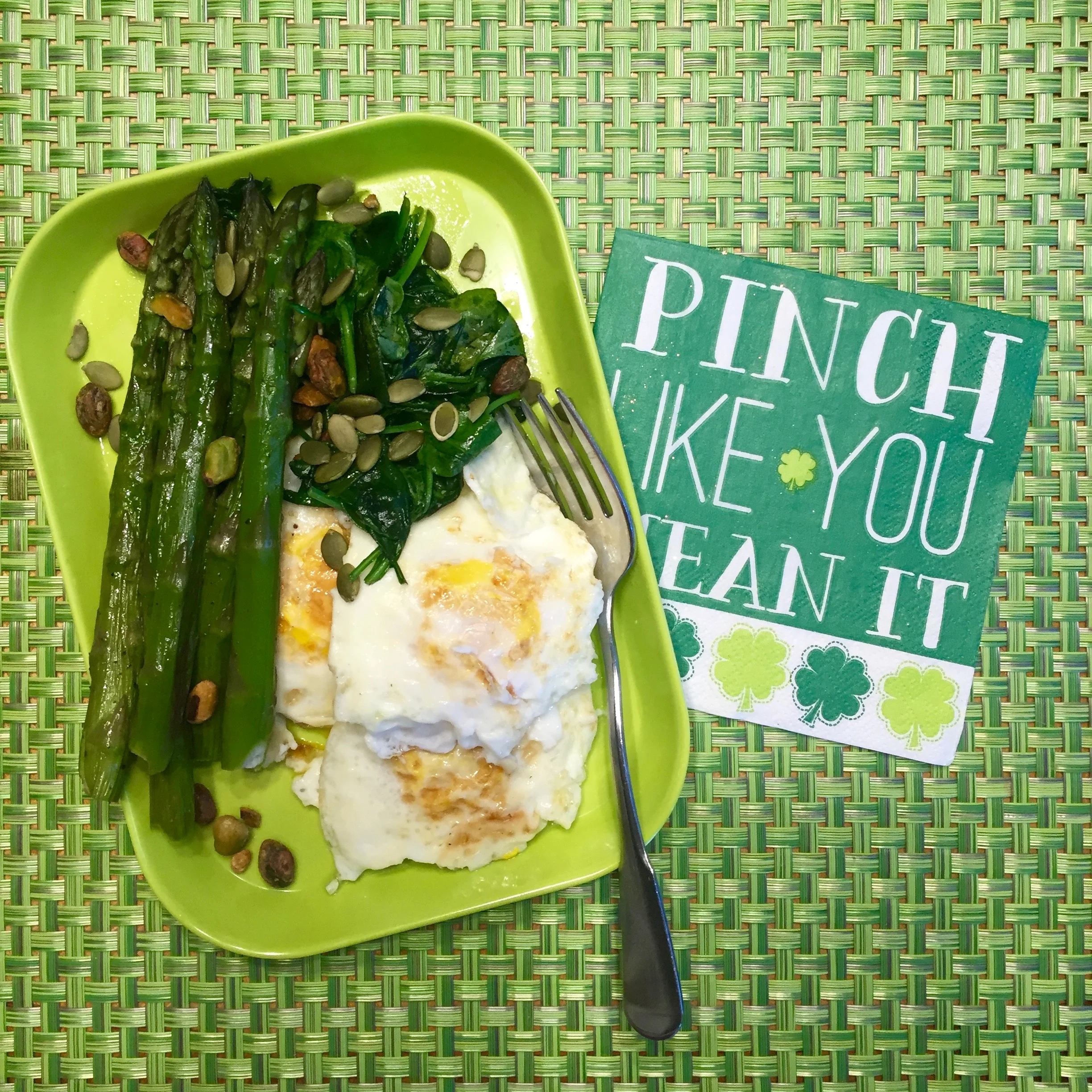 Breakfast: Three eggs + spinach (cooked in 1 T ghee) + asparagus (left-over) + pepitas + pistachio nuts. 