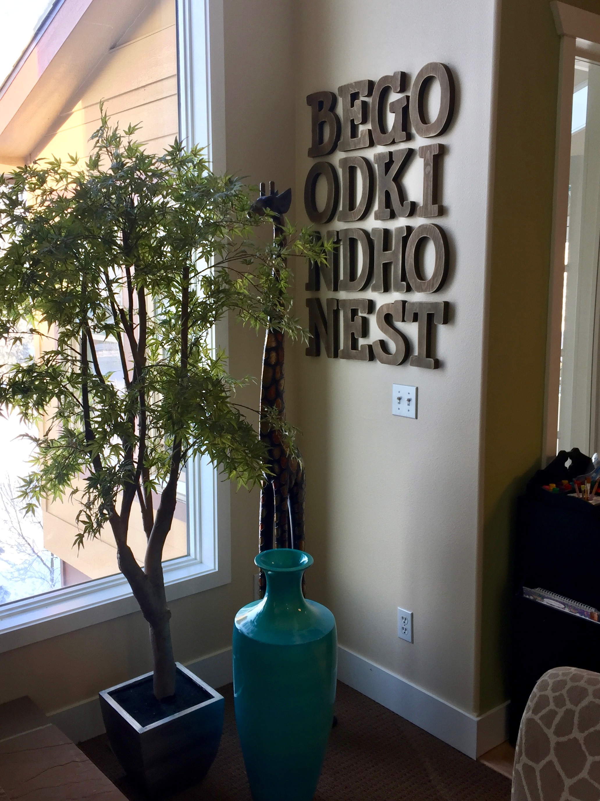 This is by far my favorite addition—wood letters from Hobby Lobby. I love the texture they provide on this wall. 