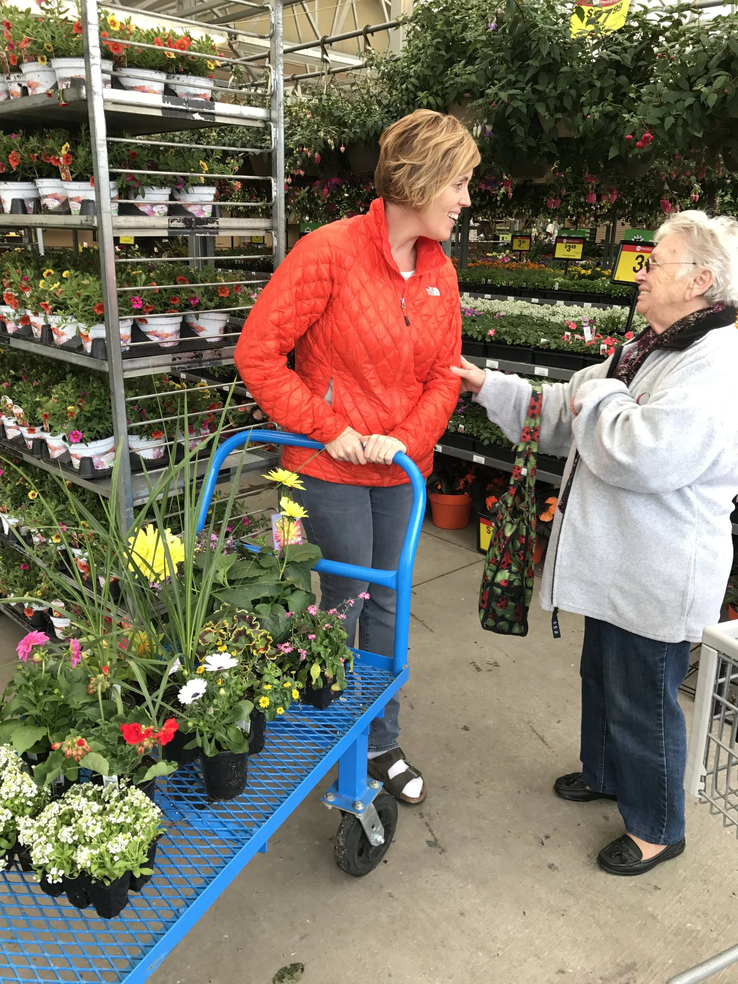 Buy birthday flowers and meeting this really sweet lady from Germany. I was so tickled that my hubby took a picture!