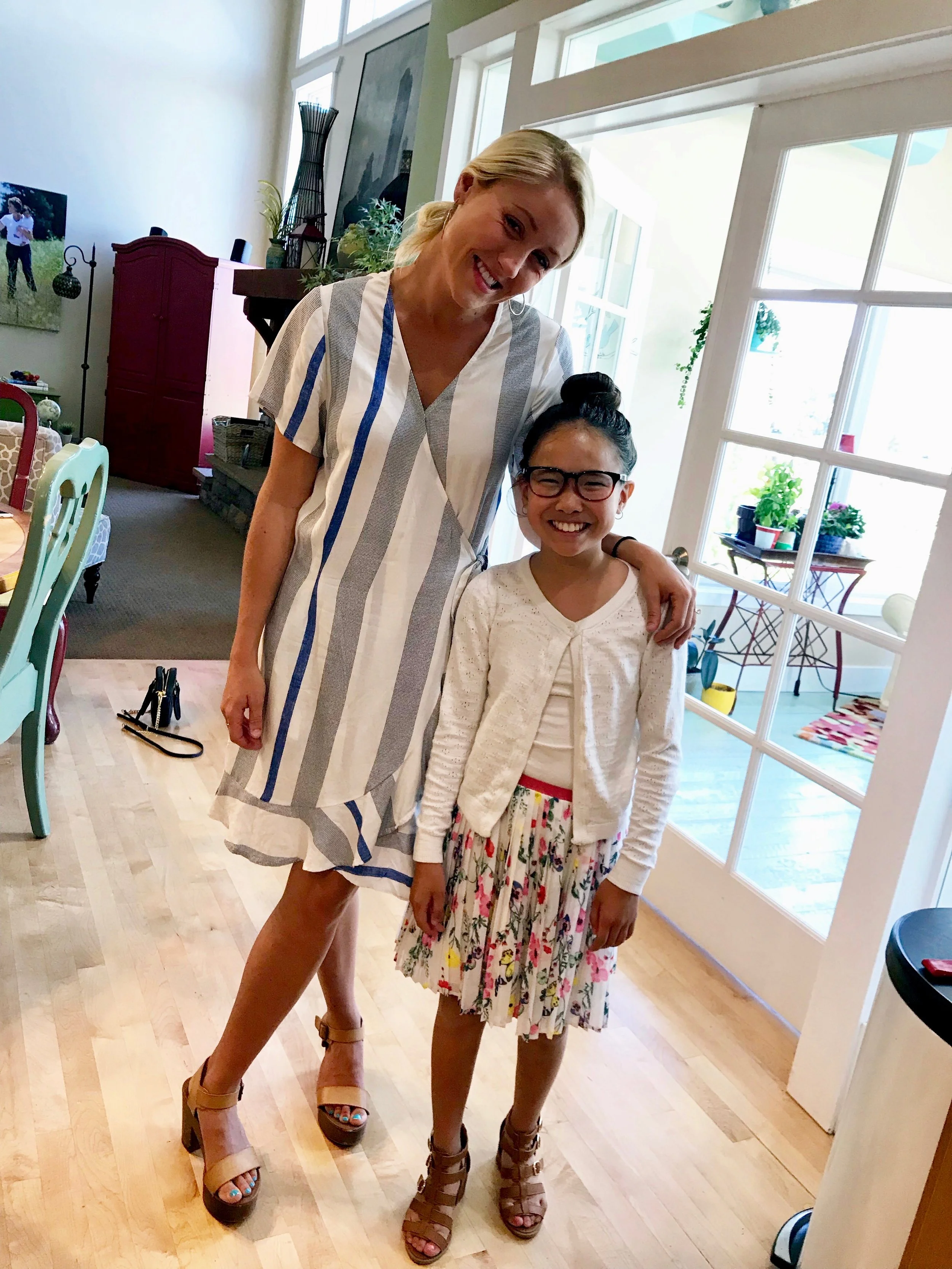 I'm LOVING the relationship that is developing between these two sisters. Here Addie is sporting what we refer to as a "Lauren bun" which when worn with her first pair of high-heels freaked me out a little. She is growing and even though she is little, she is developing into a beautiful young woman. 