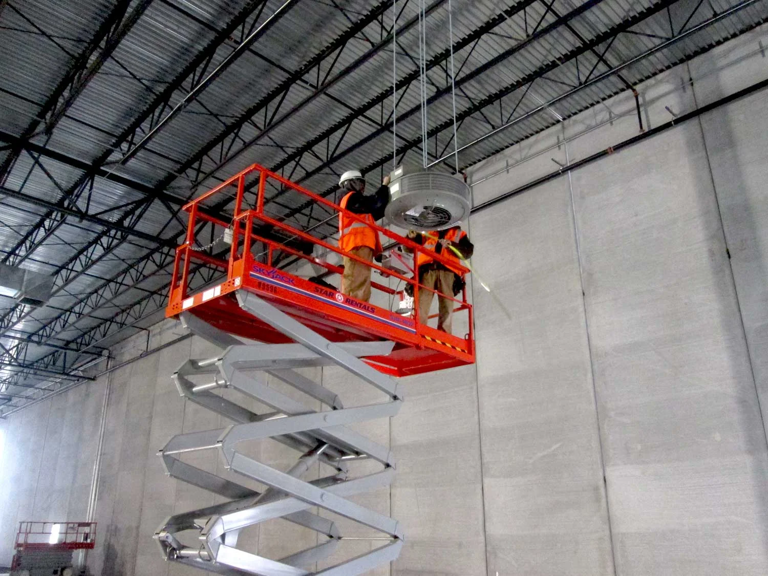 Installation of overhead air circulation units for McDougall’s refrigerated processing room.