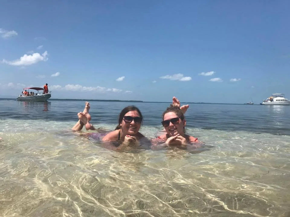 Emily and I on the beach of South Water Caye in Belize on Spring Break