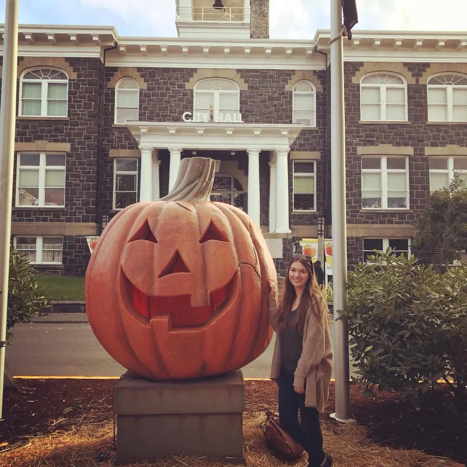 HALLOWEENTOWN! One of my favorite memories. This was taken in 30 degree weather at 8am, before the crowds overtook this pumpkin for photo ops :)&nbsp;