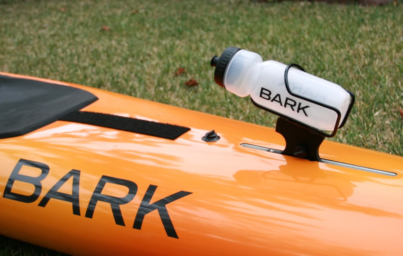 Water Bottle on Orange Board