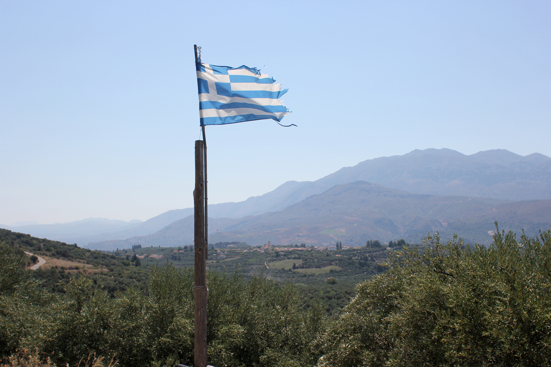 The amazing landscape, stunning views, but with tattered flag in the foreground, sadly, felt so appropriate.