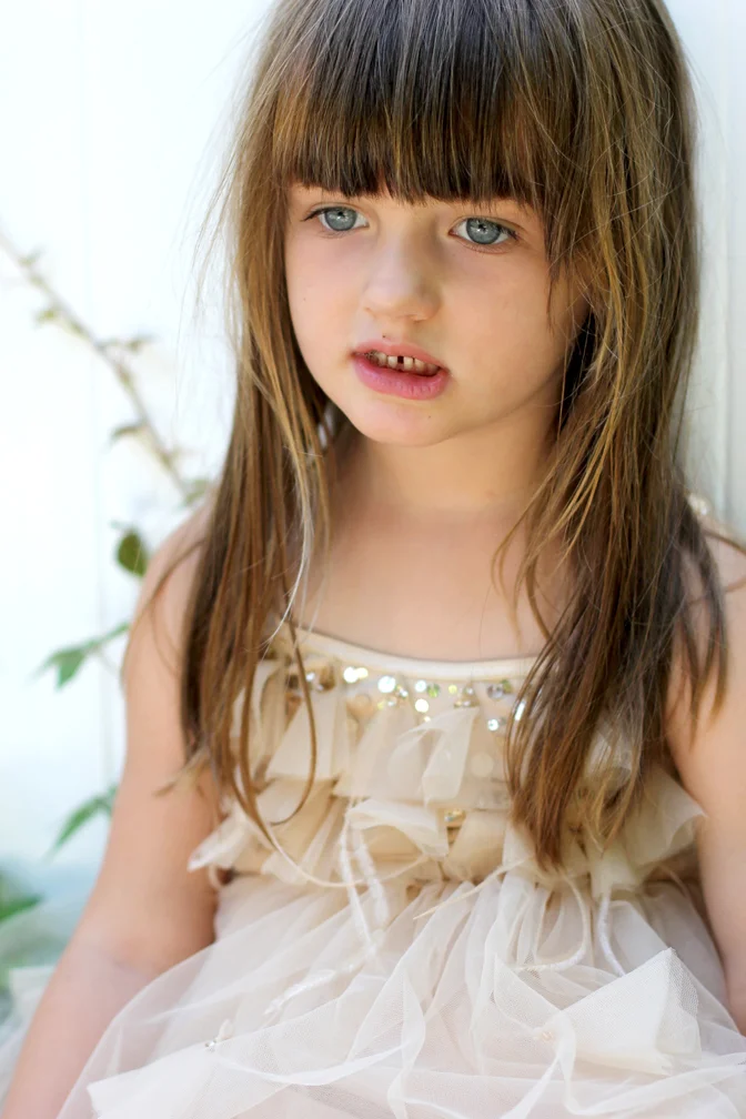 "Mommy I can't wait to wear this dress to school and show all my friends how beautiful it is."