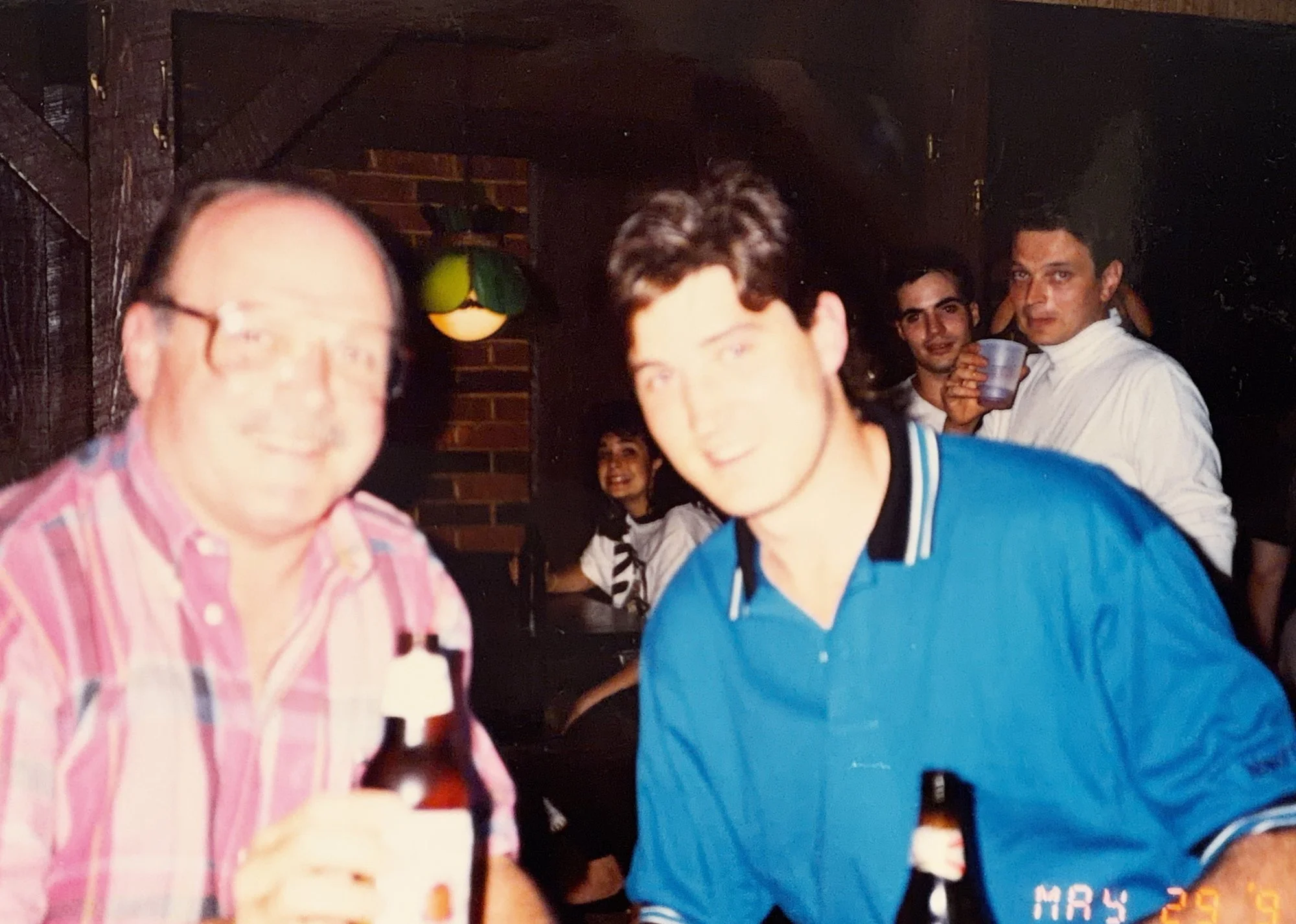 Saloon founder Jim Sheppard and Penguins legend Mario Lemieux sharing a beer at The Saloon, early 1990s