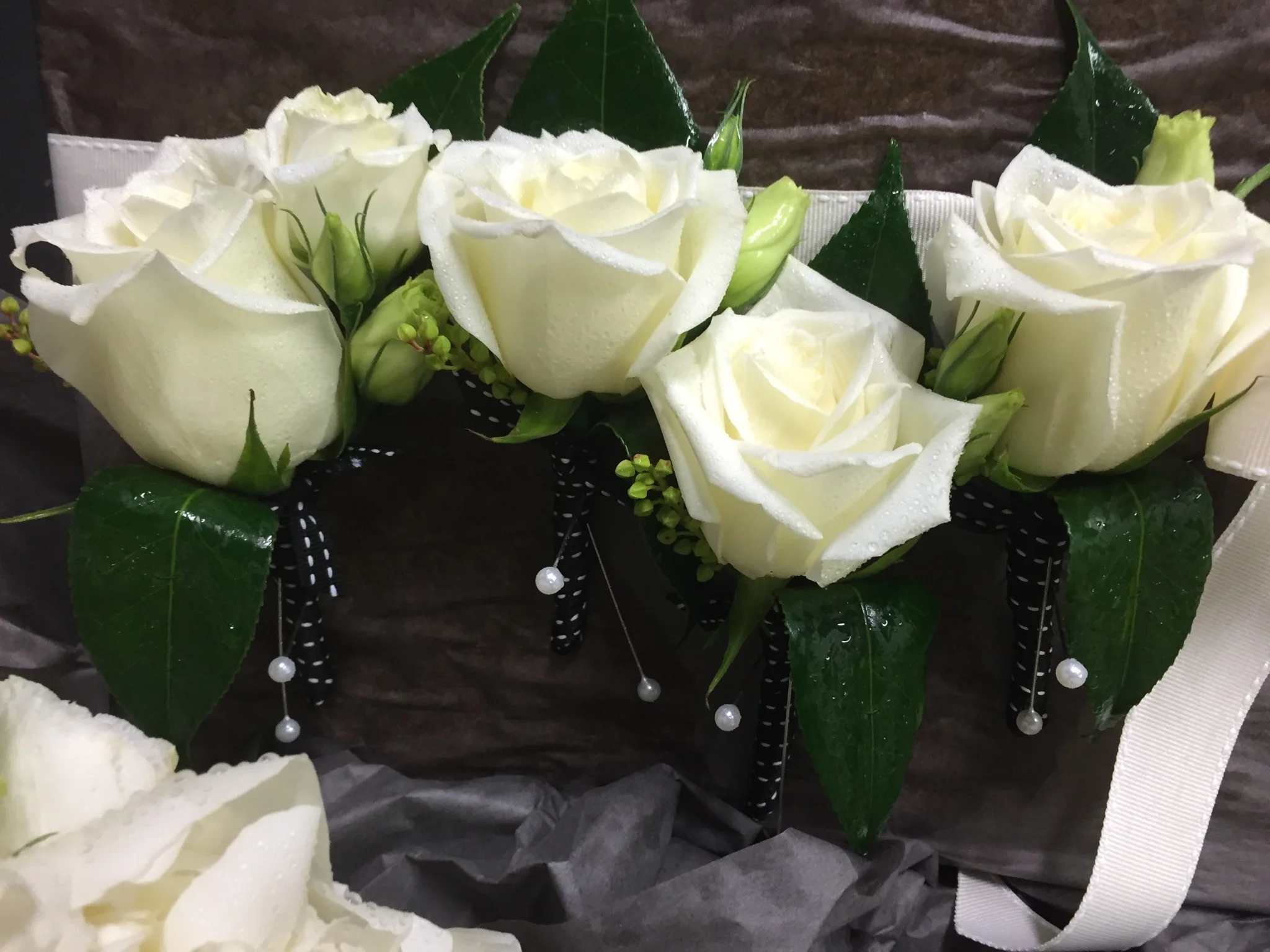 Buttonholes white 2.jpg