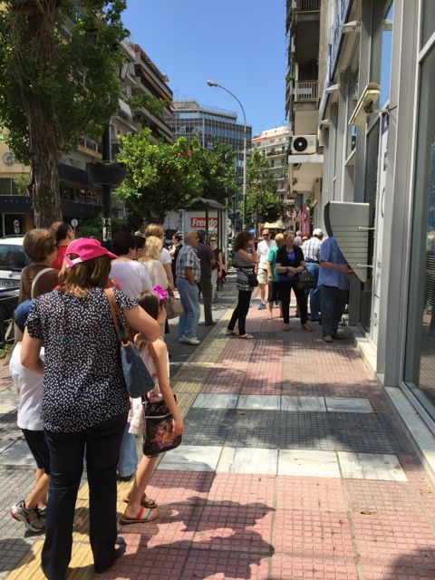 People lined up all over Athens to withdraw funds from their bank accounts during the EU Greek crisis. I snapped this photo on July 1, the day I left Greece.