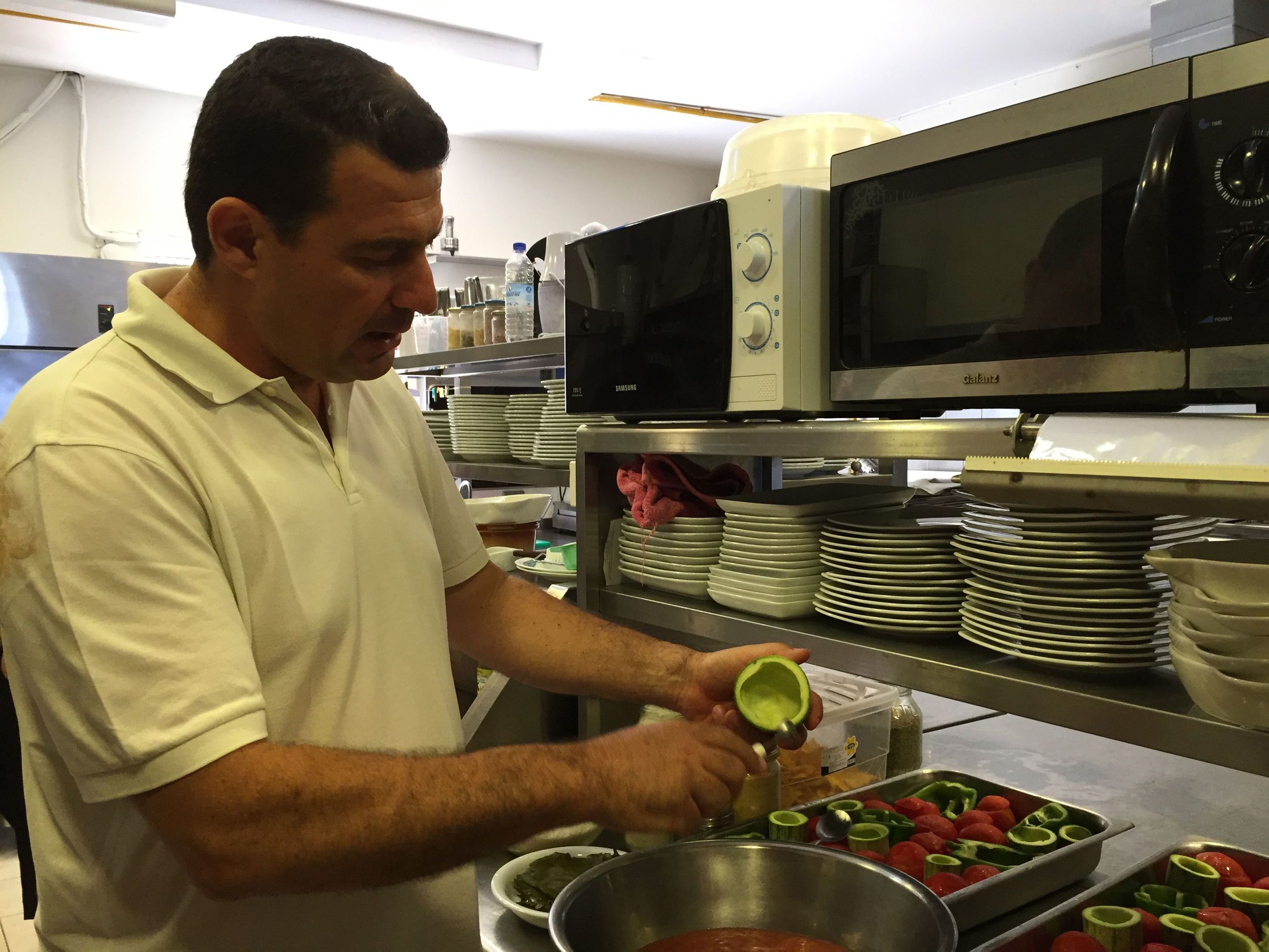 Vassili Gialamarakis gives a food demonstration in the Mistral Hotel kitchen. (Betsy Herbert)
