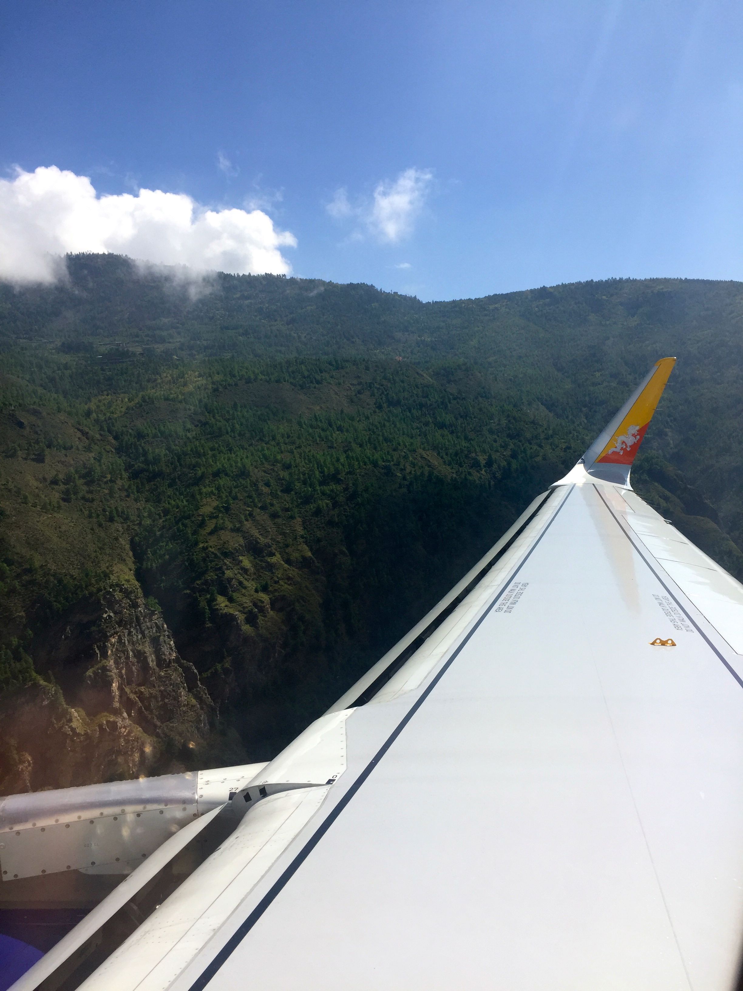 Beginning our descent into Paro International Airport, through the peaks of the Himalayas.