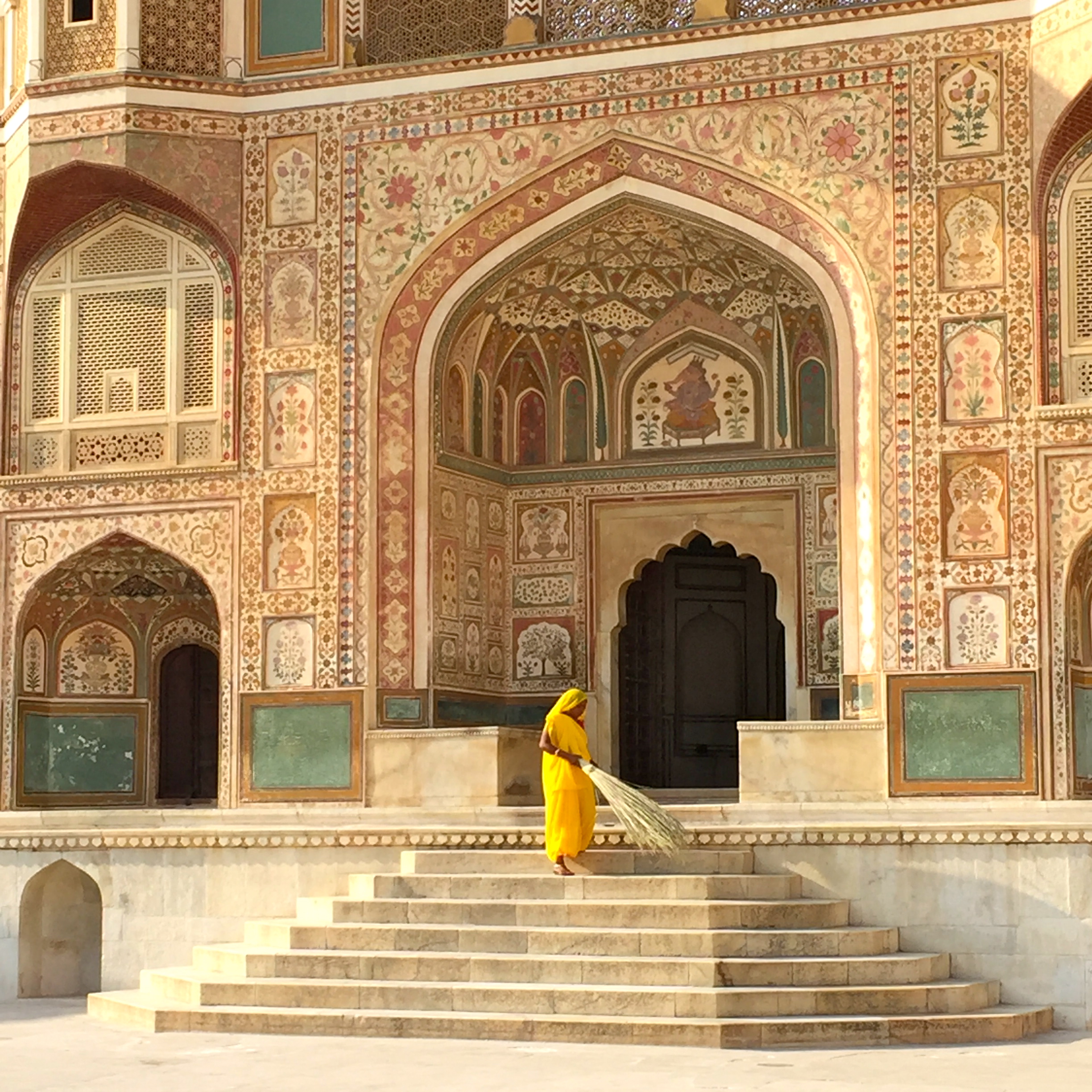 Woman sweeping the steps of the Amber Palace, Jaipur