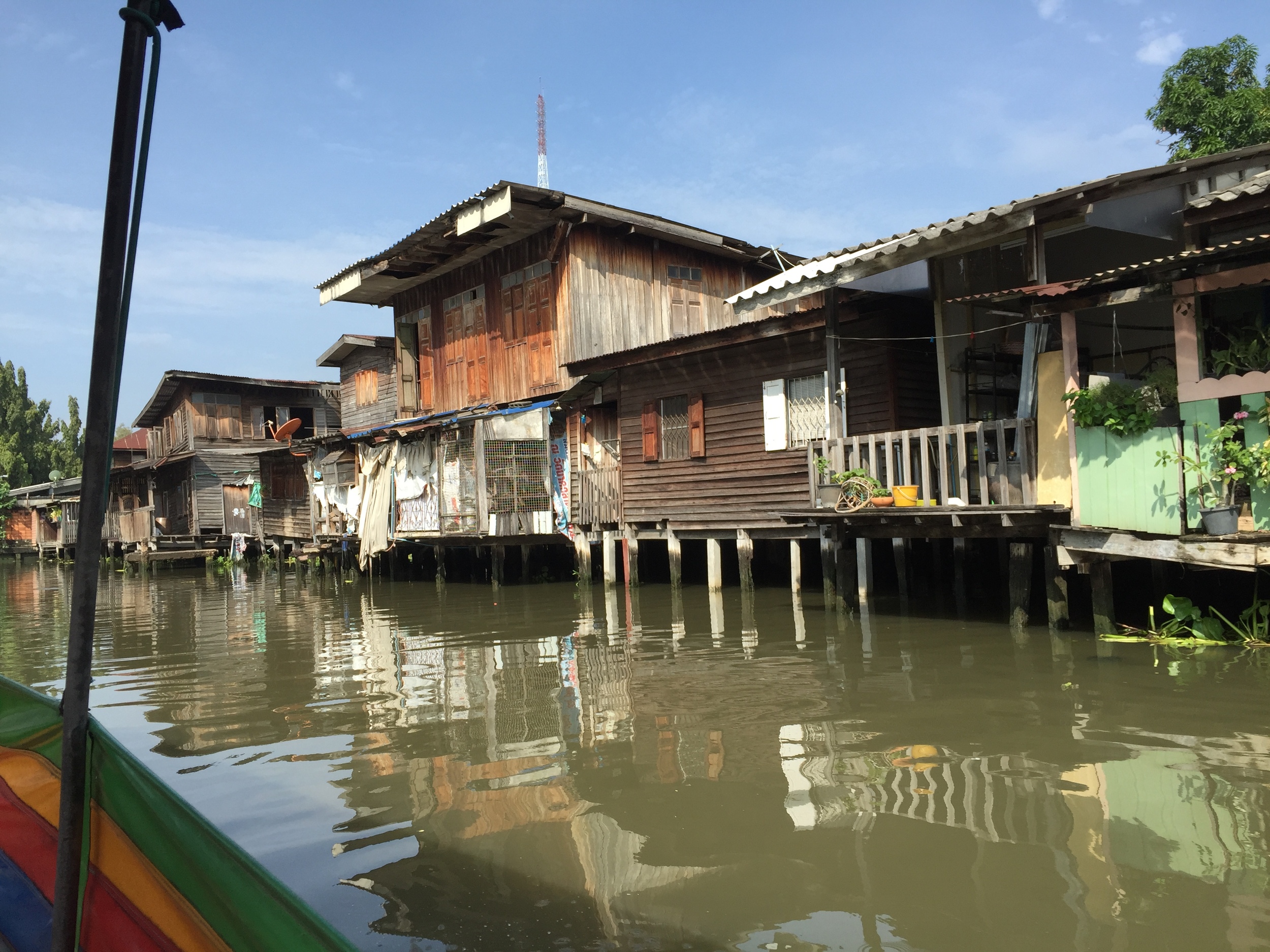 Cruising the canals of Bangkok through a fascinating neighborhood of houses built on the water.