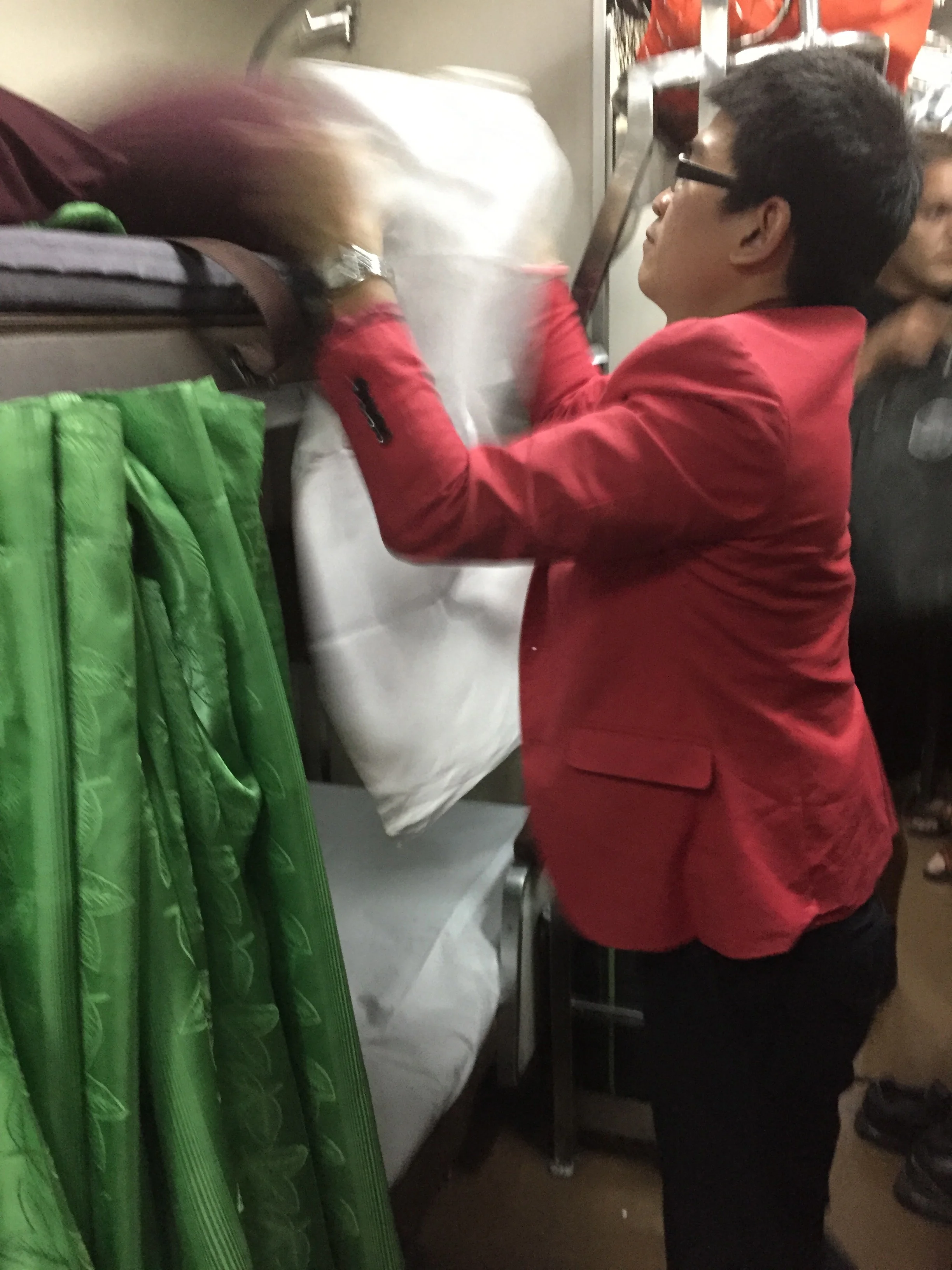 Our amazing steward, otherwise known as "Boy on the Train," who provided entertainment and invaluable service on the otherwise uninspiring trip from Bangkok to Chang Mai.