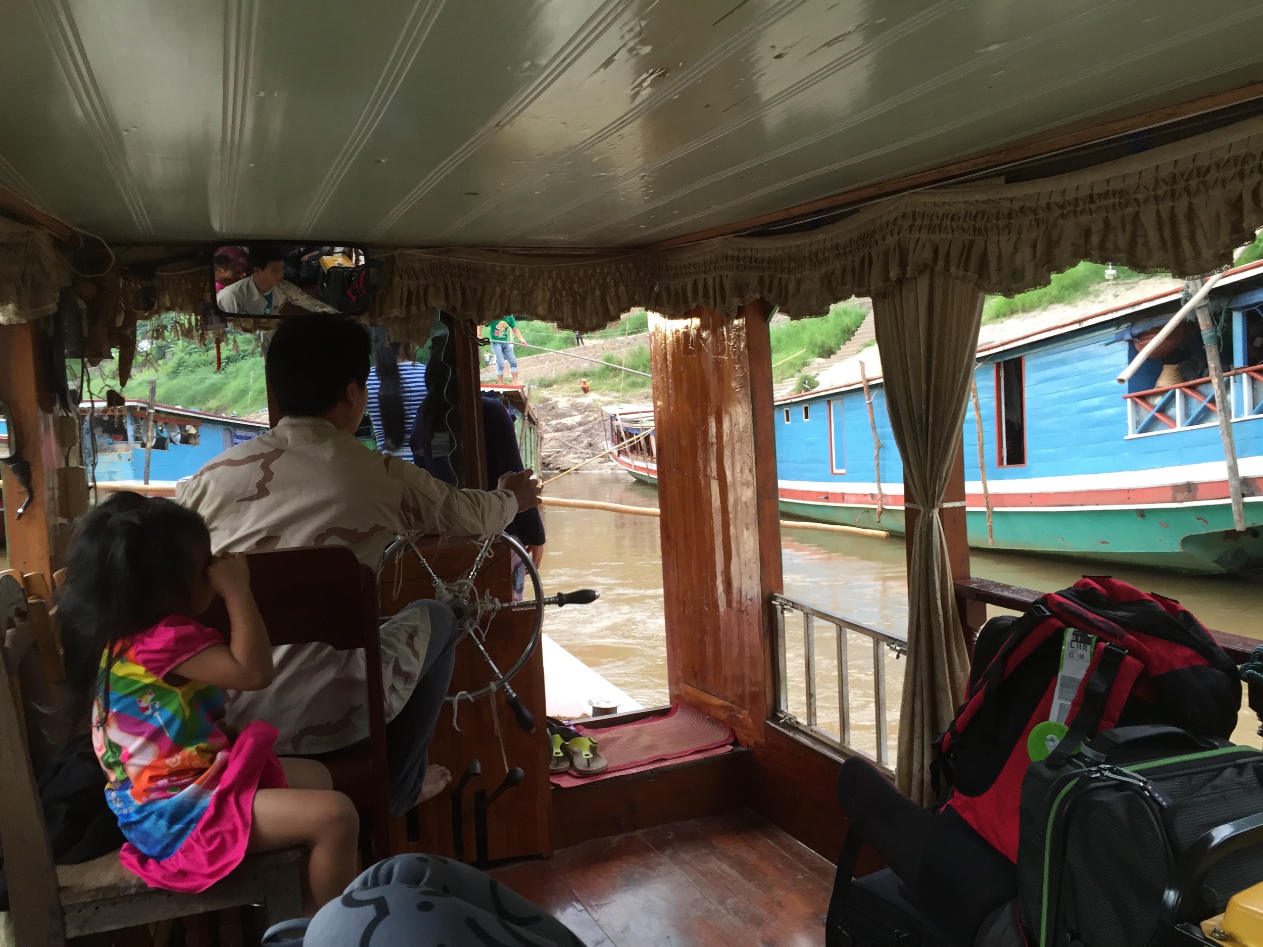 Our tour group cruised the Mekong River for two days in this river boat owned and operated by a Lao family. These boats are a thriving part of the Lao tourist industry.