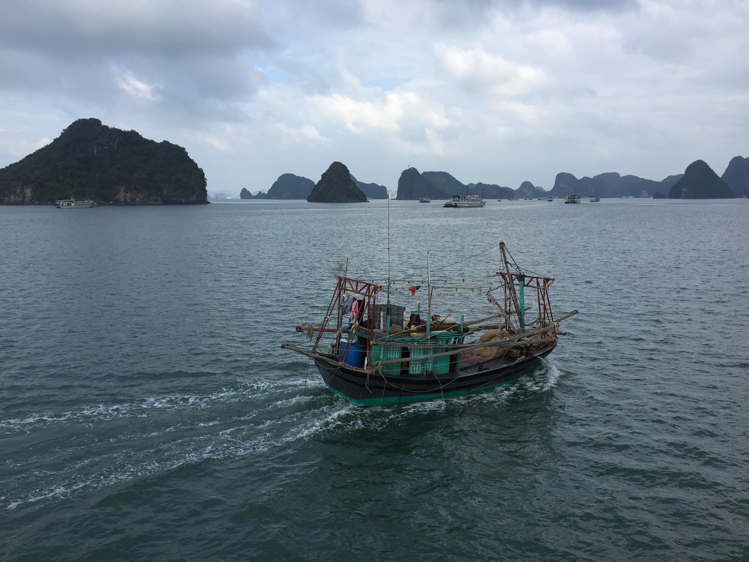 Halong Bay, within north Vietnam's Gulf of Tonkin and famous for incidents that led to the official beginning of the Vietnam War in 1965, is now a primary tourist destination in Vietnam