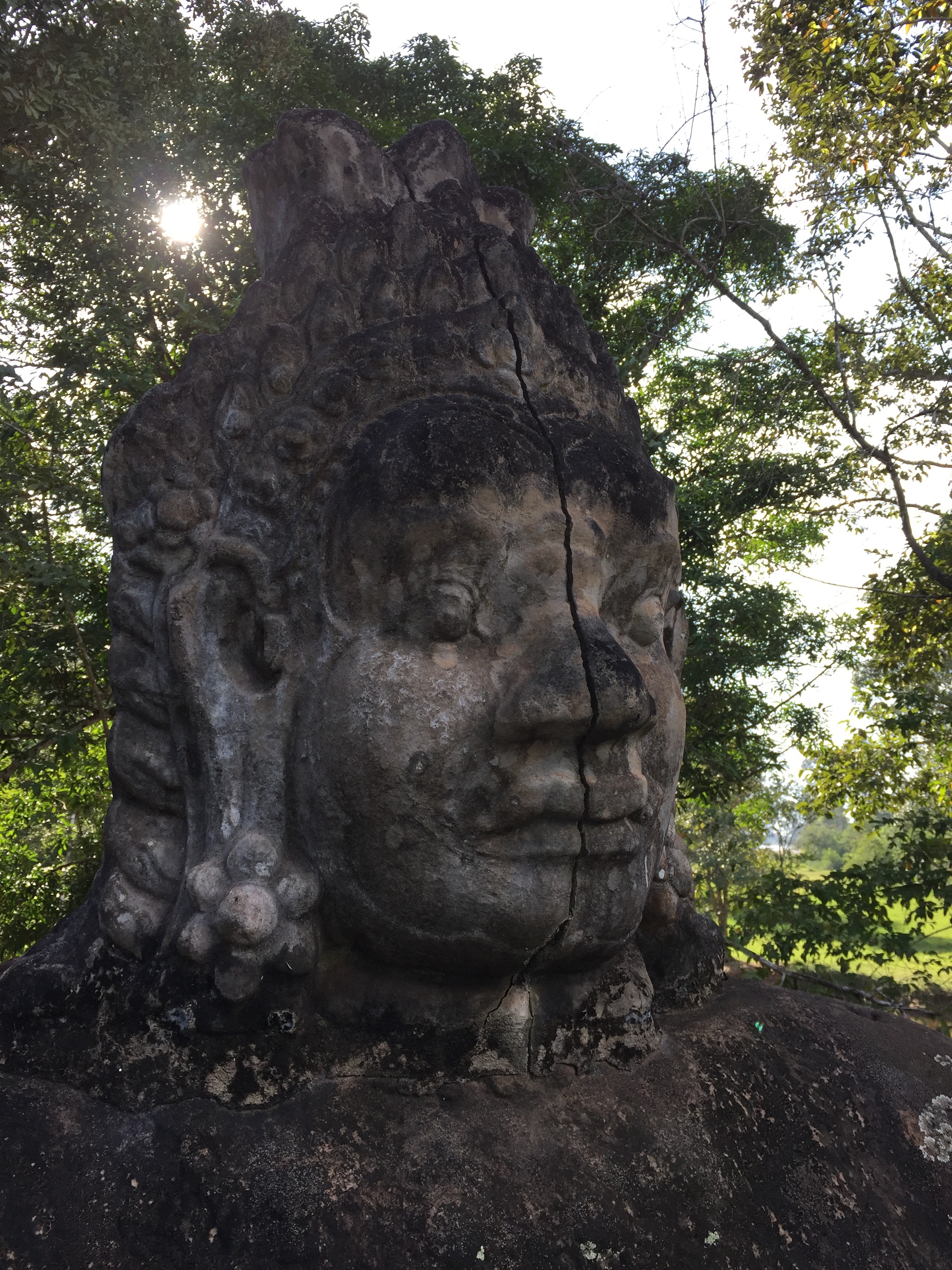 Huge stone head outside the entrance to Angkor Thom.