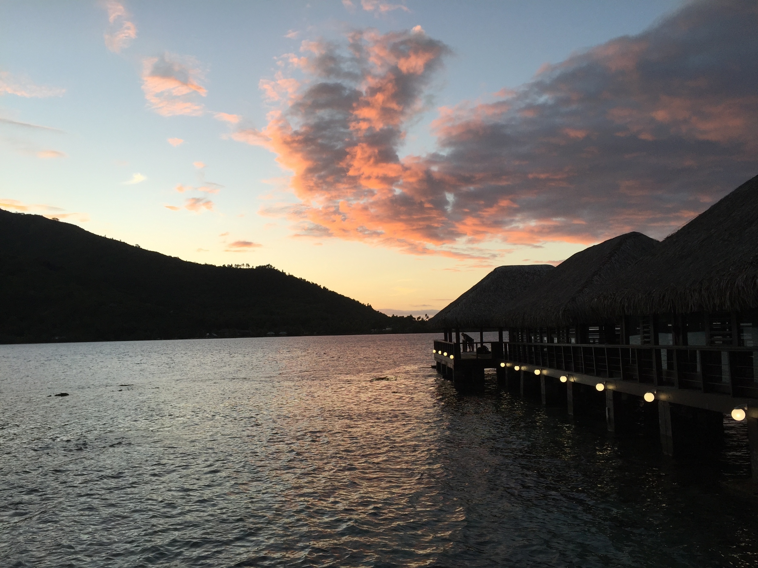 Sunset on Cook's Bay at the Kaveka Hotel's restaurant/pier.