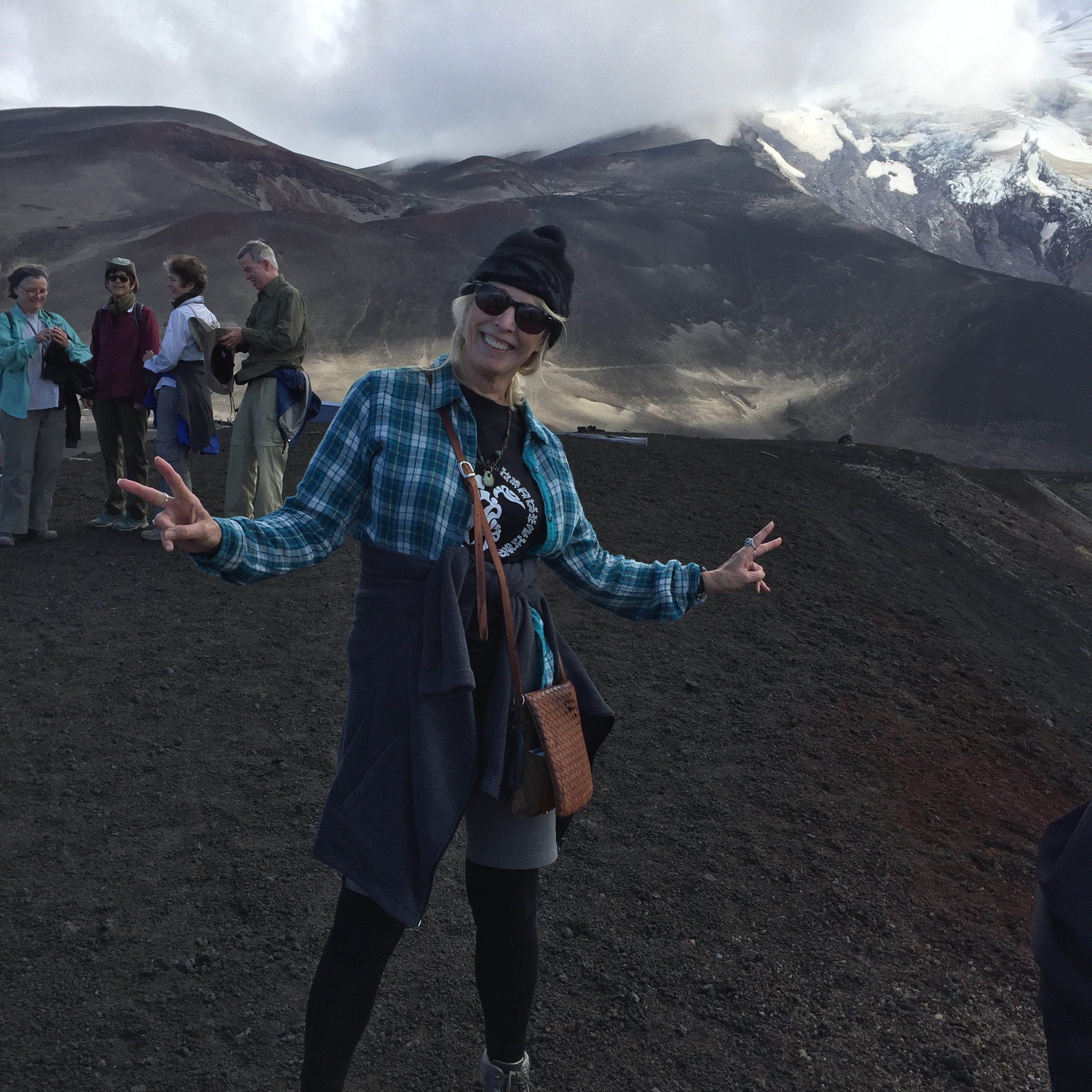 Me feeling lucky to have such a great view of Osorno. The clouds have partially cleared around Osorno's top.