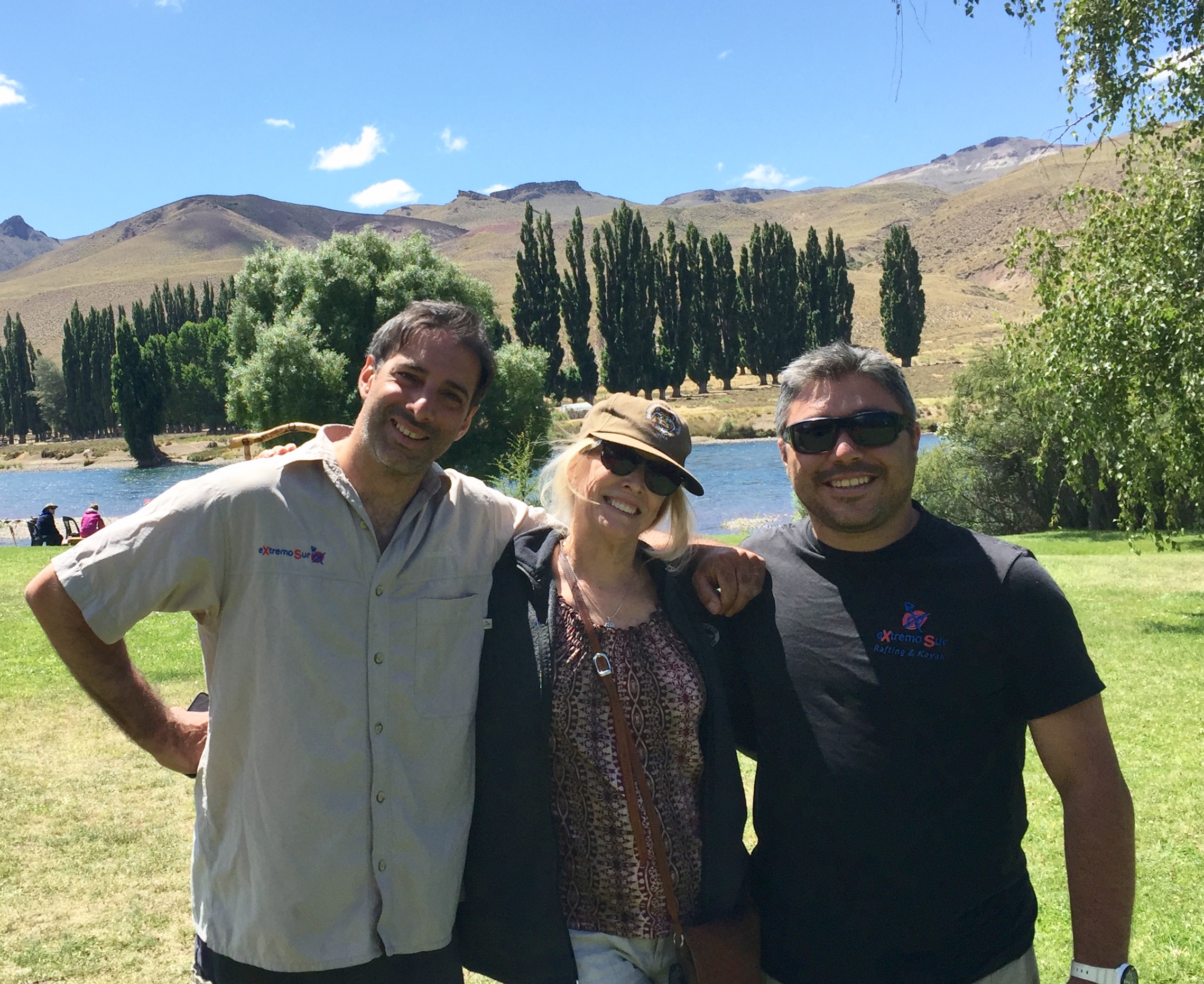 This is me enjoying the company of our two river guides after we landed alongside the Limay River. Behind us you can see some poplar trees, which are not native to Chile, but were planted by ranchers to supply much-needed shade.
