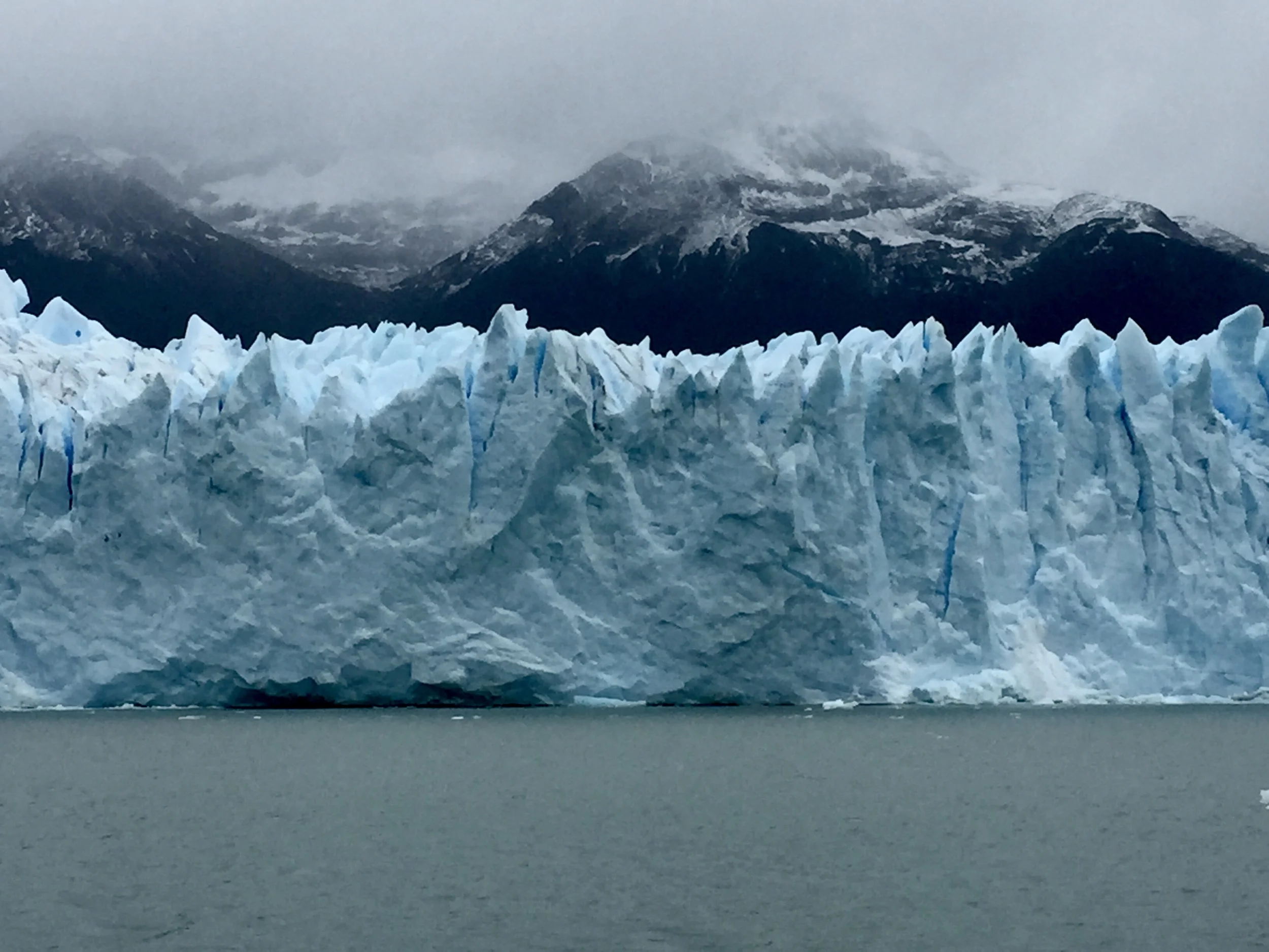 The face of Argentina’s Perito Moreno Glacier is as tall as a 20-story building. In the background are the Andes and in the foreground is Lake Argentina.
