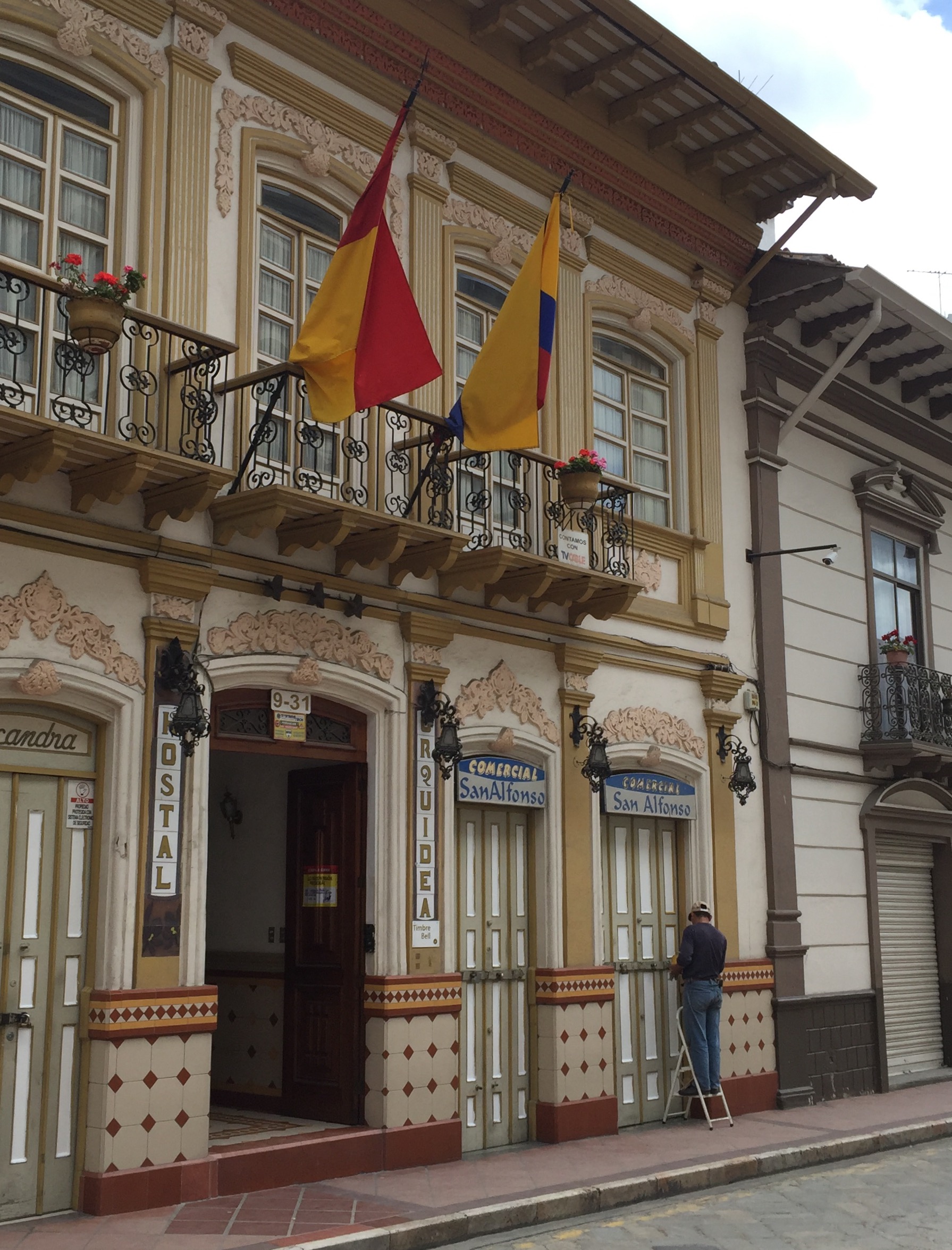 Typical architecture complete with tile front and wrote iron balcony in Cuenca, Ecuador.