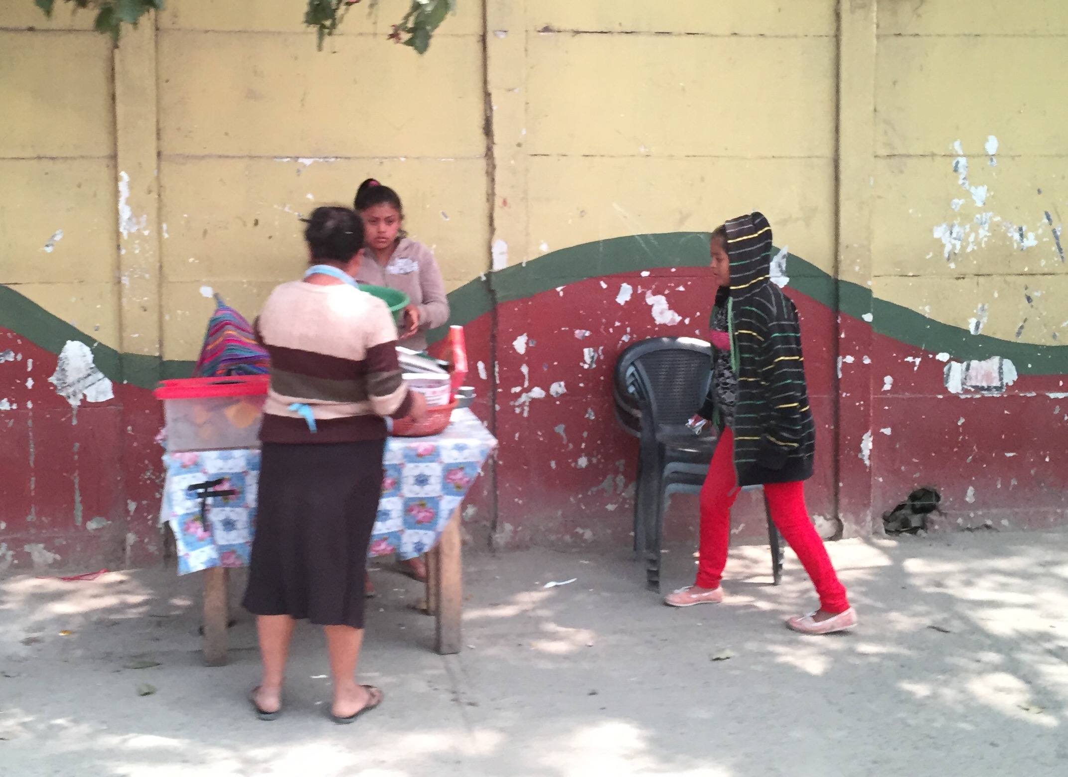 A Zone 3 woman and her two daughters reselling scavenged items from the Guatemala City Garbage Dump.