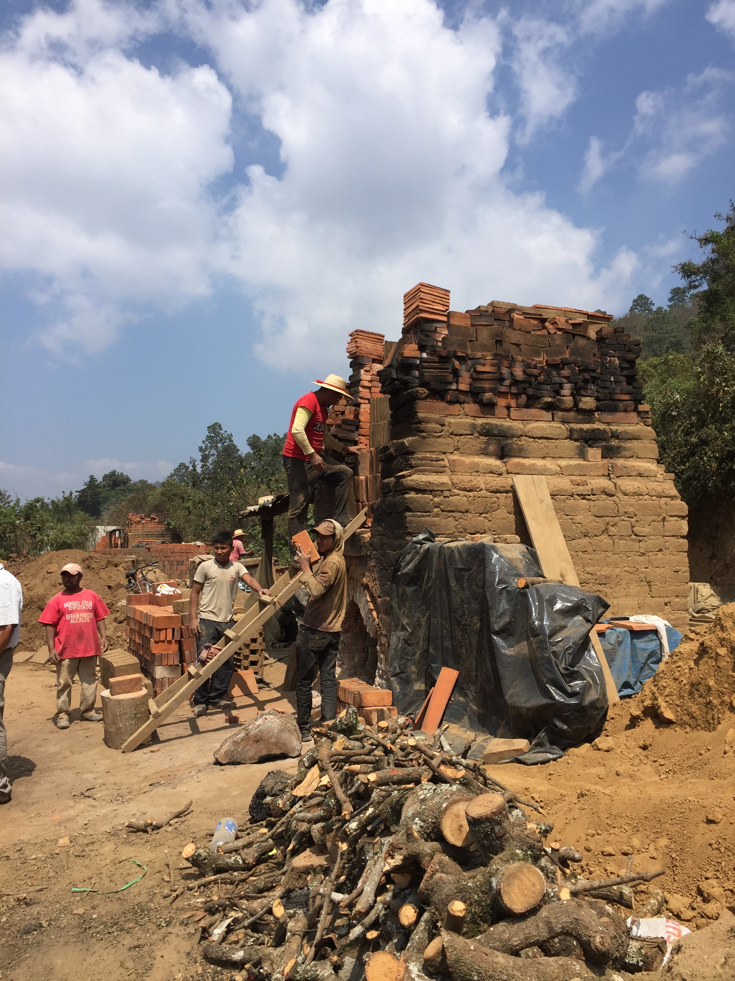 This is a small local brick-making operation along the road from Guatemala City to Panajachel known as El Tejar. The much sought-after adobe bricks are hand made and fired in small kilns.