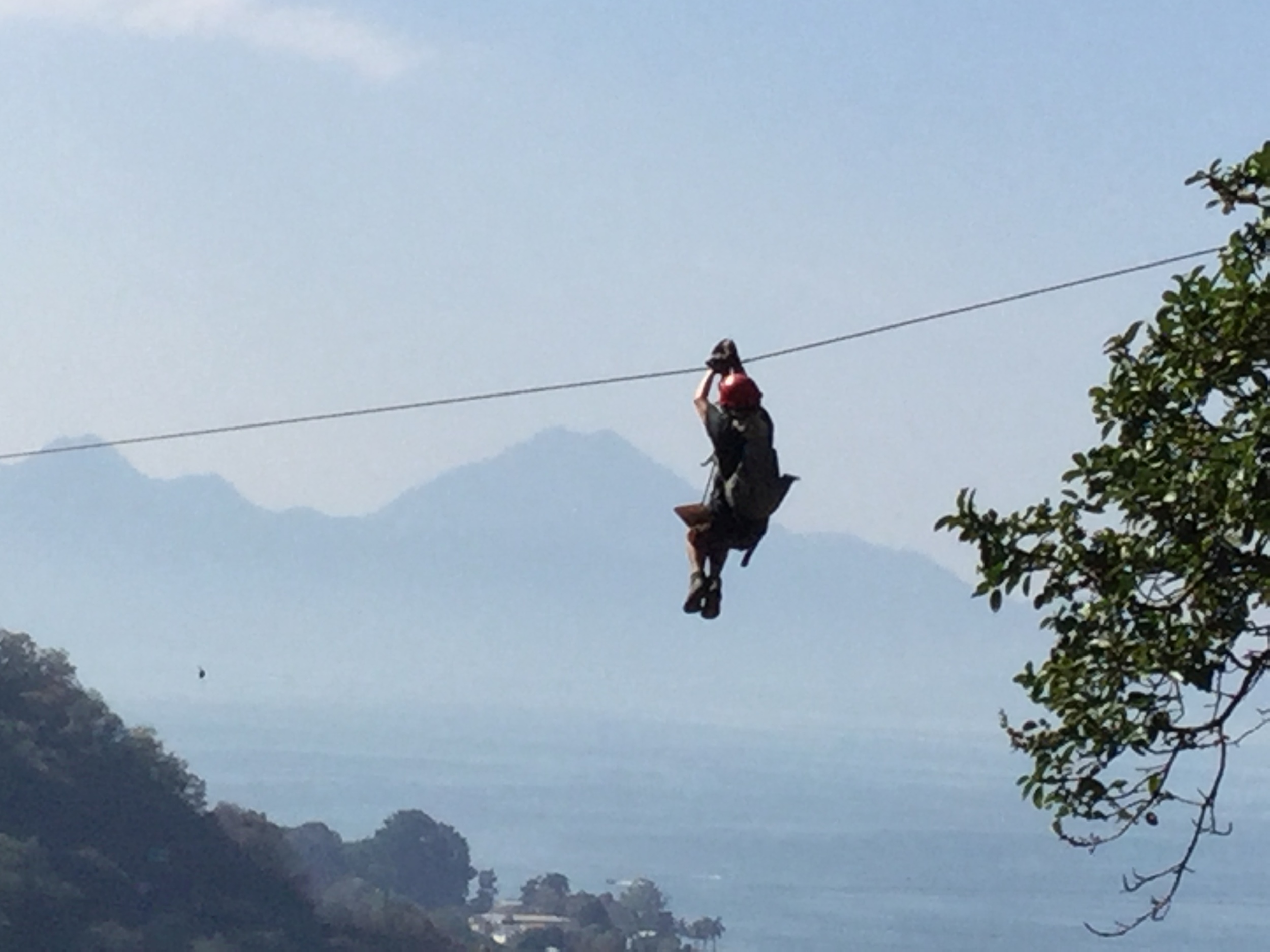 That's me ziplining through a native forest outside Pana, enjoying a terrific view of Lake Atitlan.