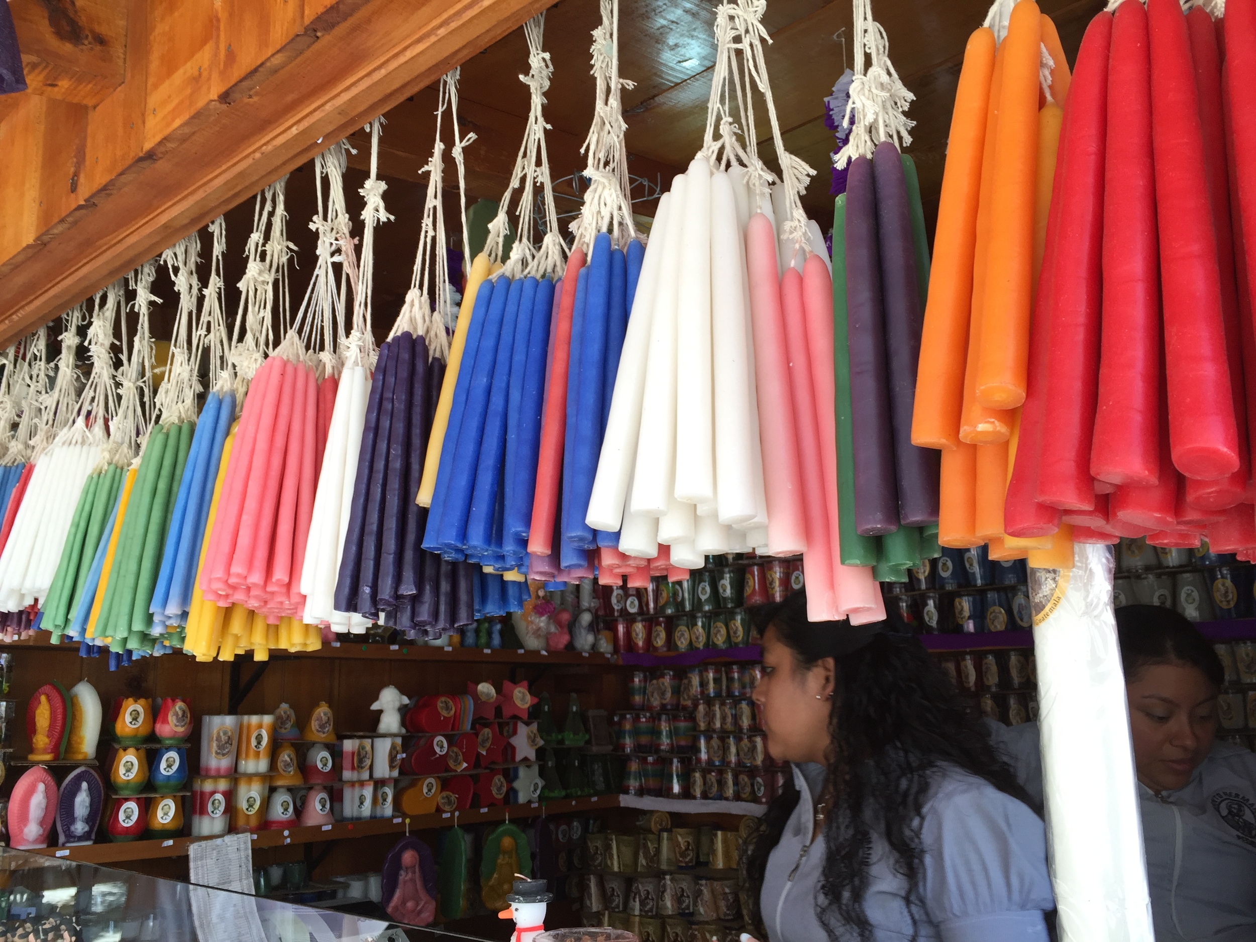 Candles available for purchase at the entrance to a local church in Antigua, Guatemala.