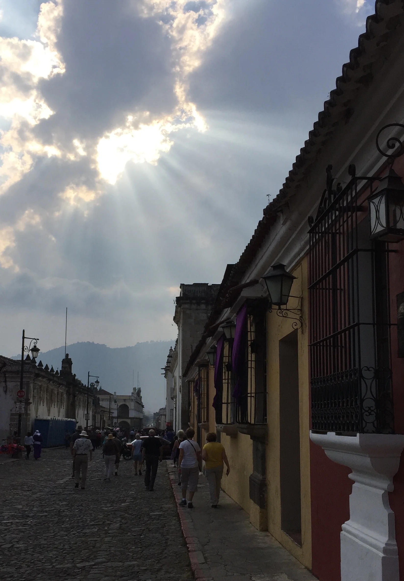 Just hours before the Easter processions are to begin, the clouds open up to let the sun rays through.