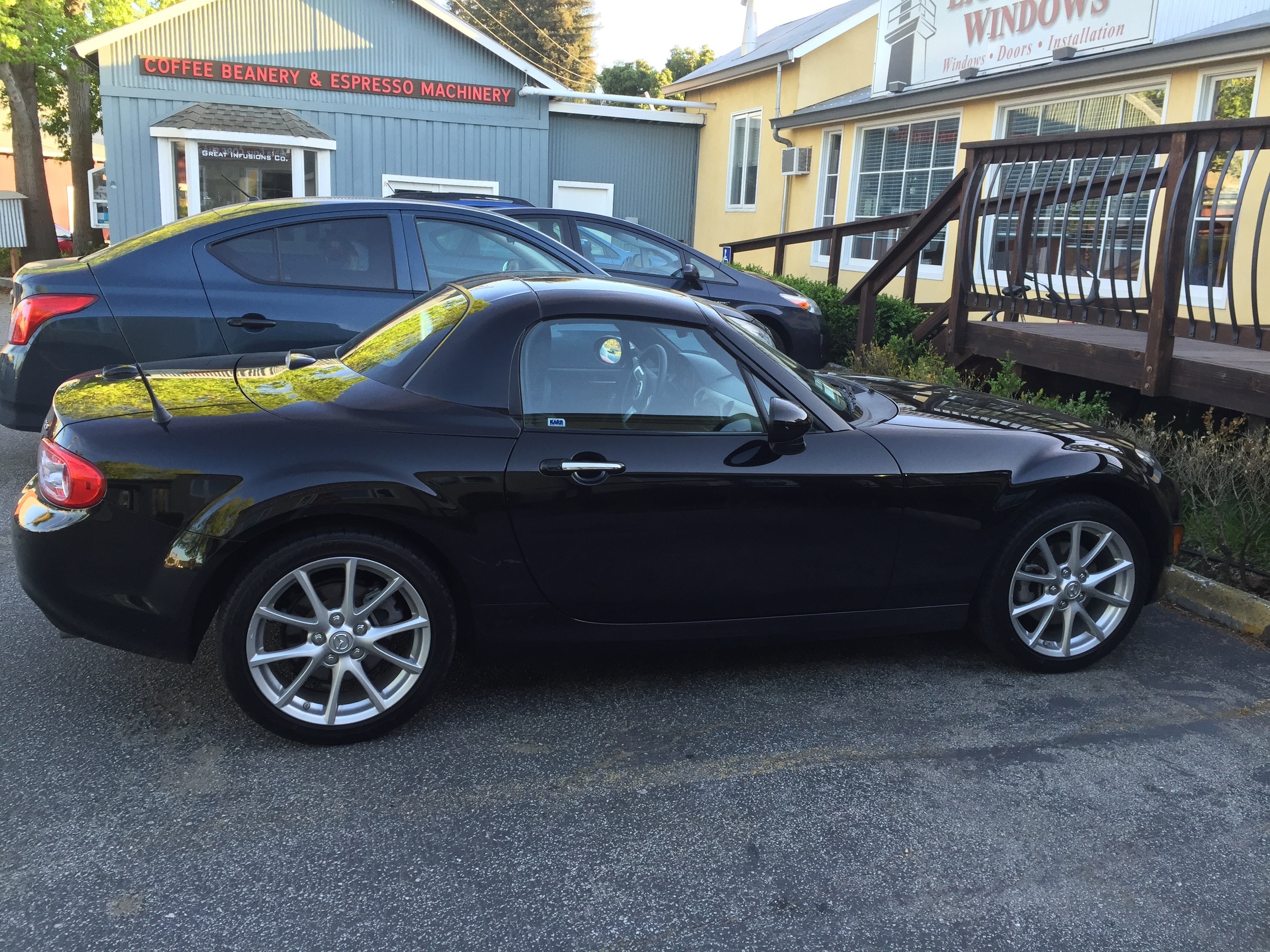 My Mazda MX5, which is apparently the second-most fuel efficient sports car on the market, after the Tesla. The MX5 is not hybrid or a plug-in, but it does get 36 mpg, and it's way cheaper than a Tesla. I thought I'd keep this until I can afford a Tesla or something else along those lines.